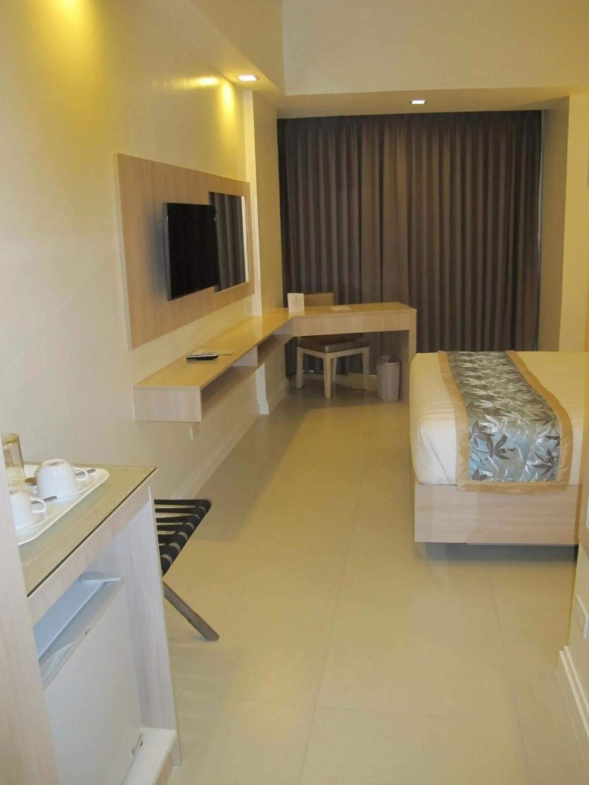 Photo of the whole room, Bed in Zerenity Hotel & Suites