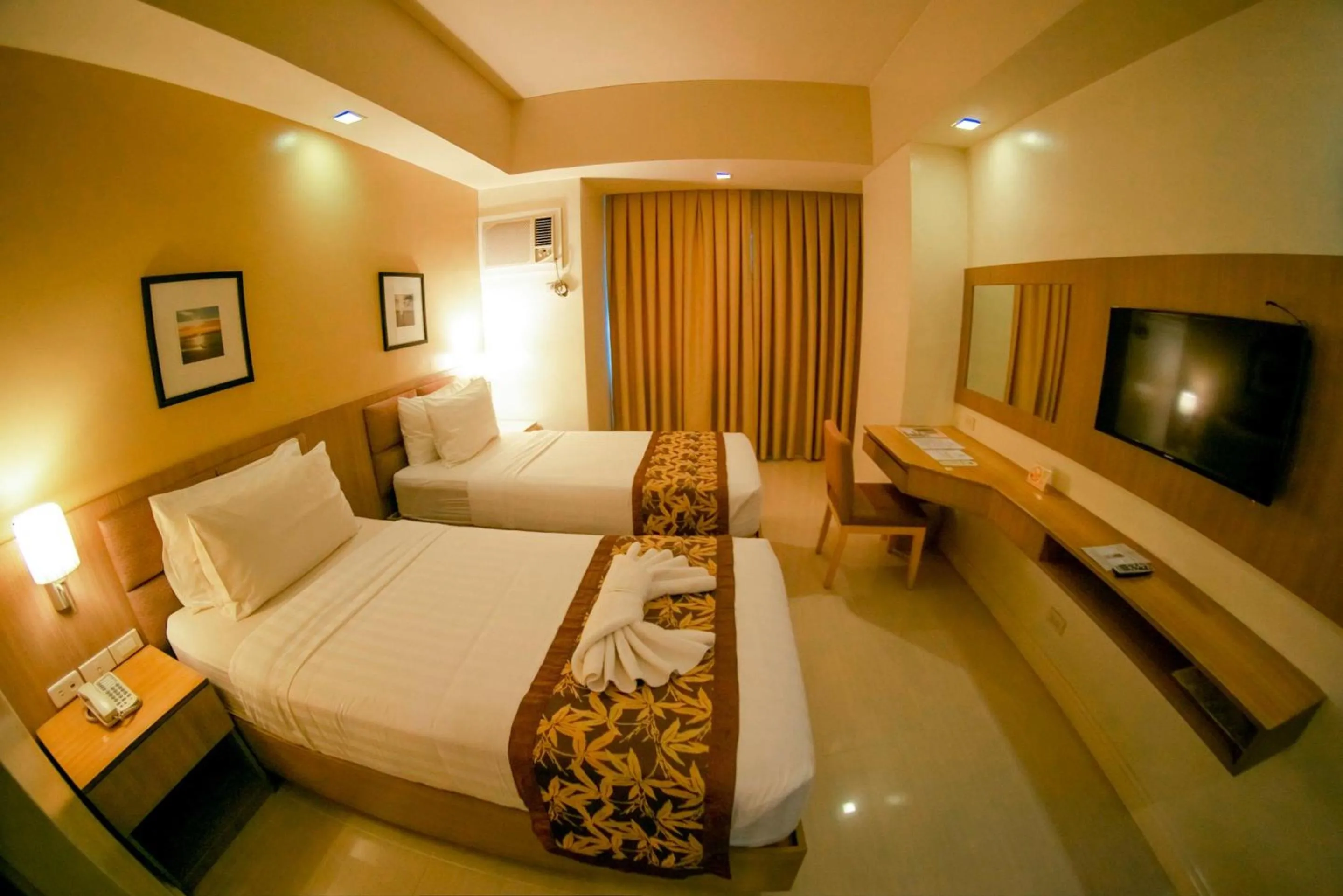 Bed in Zerenity Hotel & Suites