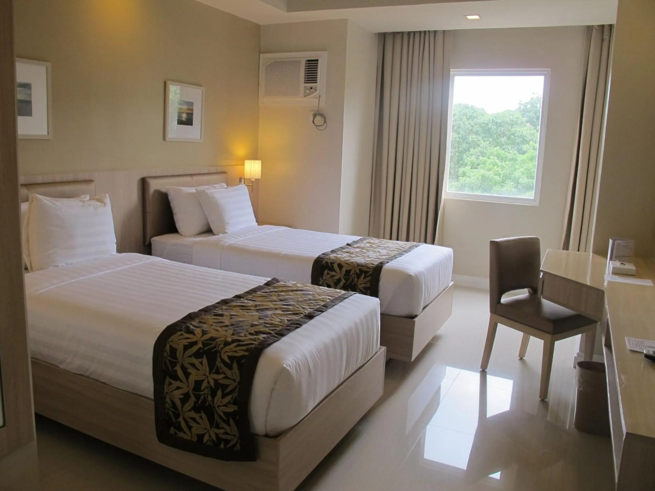 Photo of the whole room, Bed in Zerenity Hotel & Suites