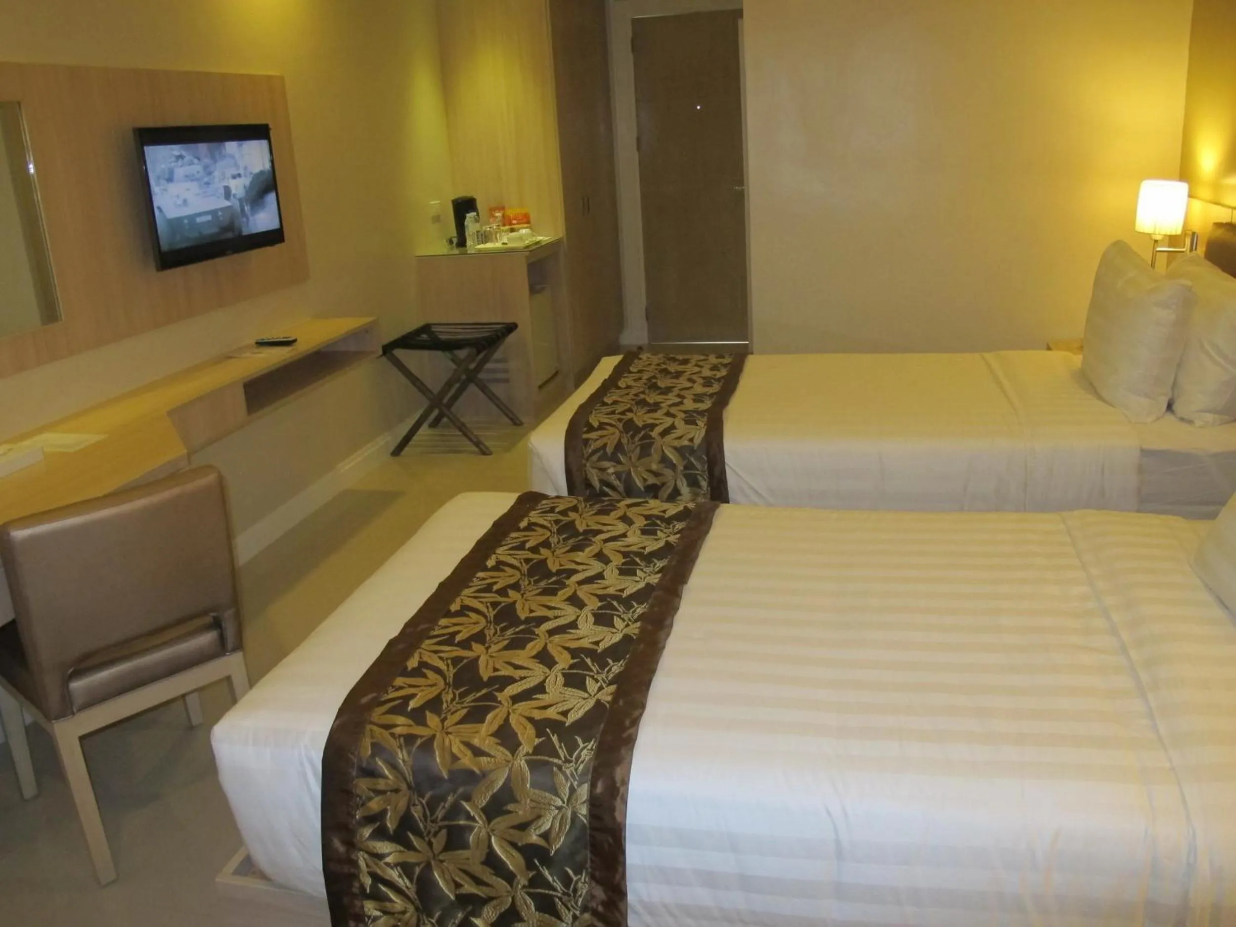 Photo of the whole room, Bed in Zerenity Hotel & Suites