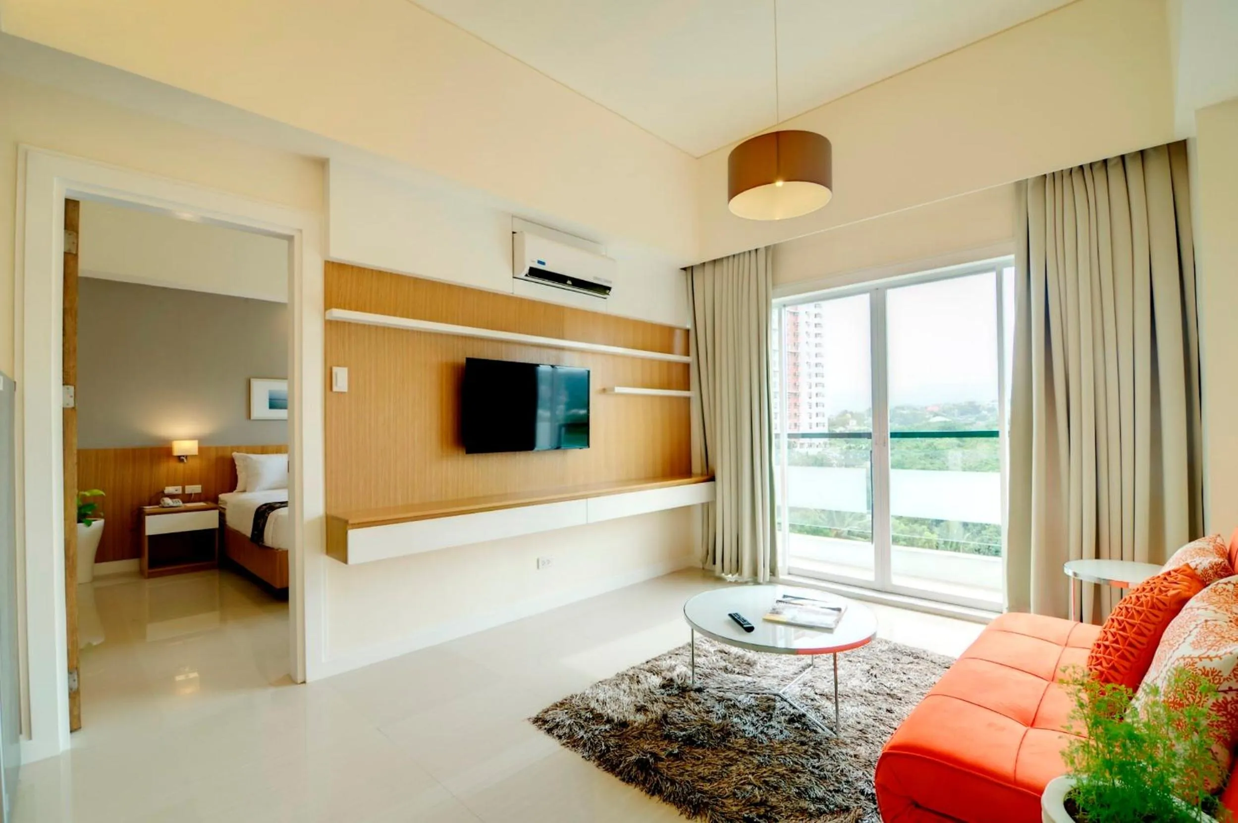 Living room, Bed in Zerenity Hotel & Suites