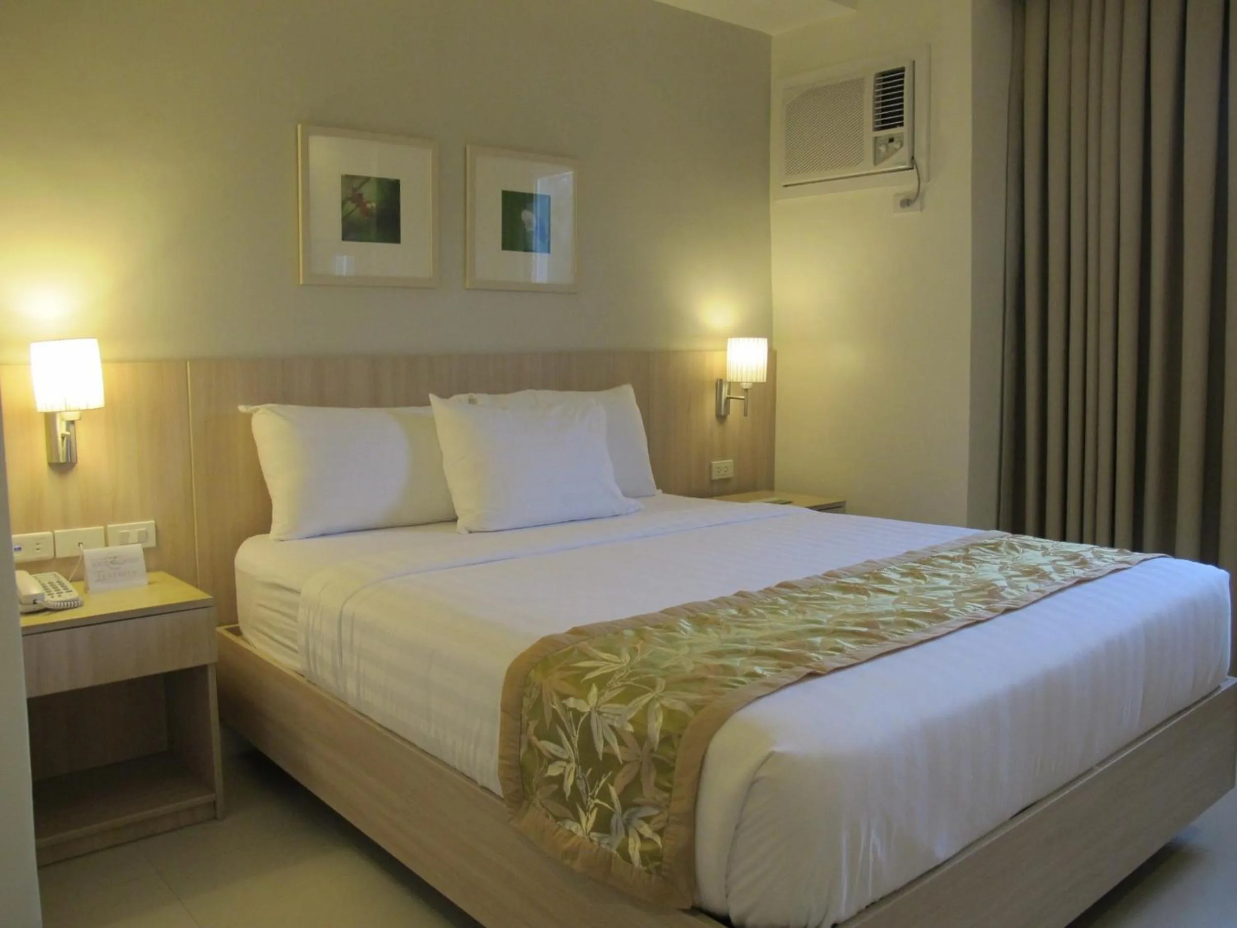 Photo of the whole room, Bed in Zerenity Hotel & Suites