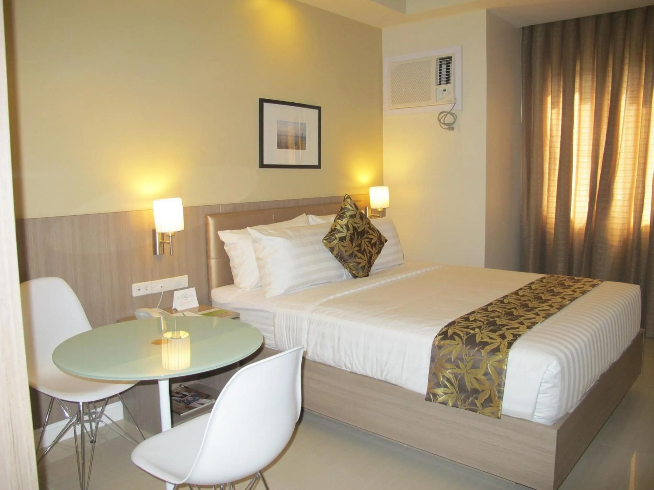 Photo of the whole room, Bed in Zerenity Hotel & Suites