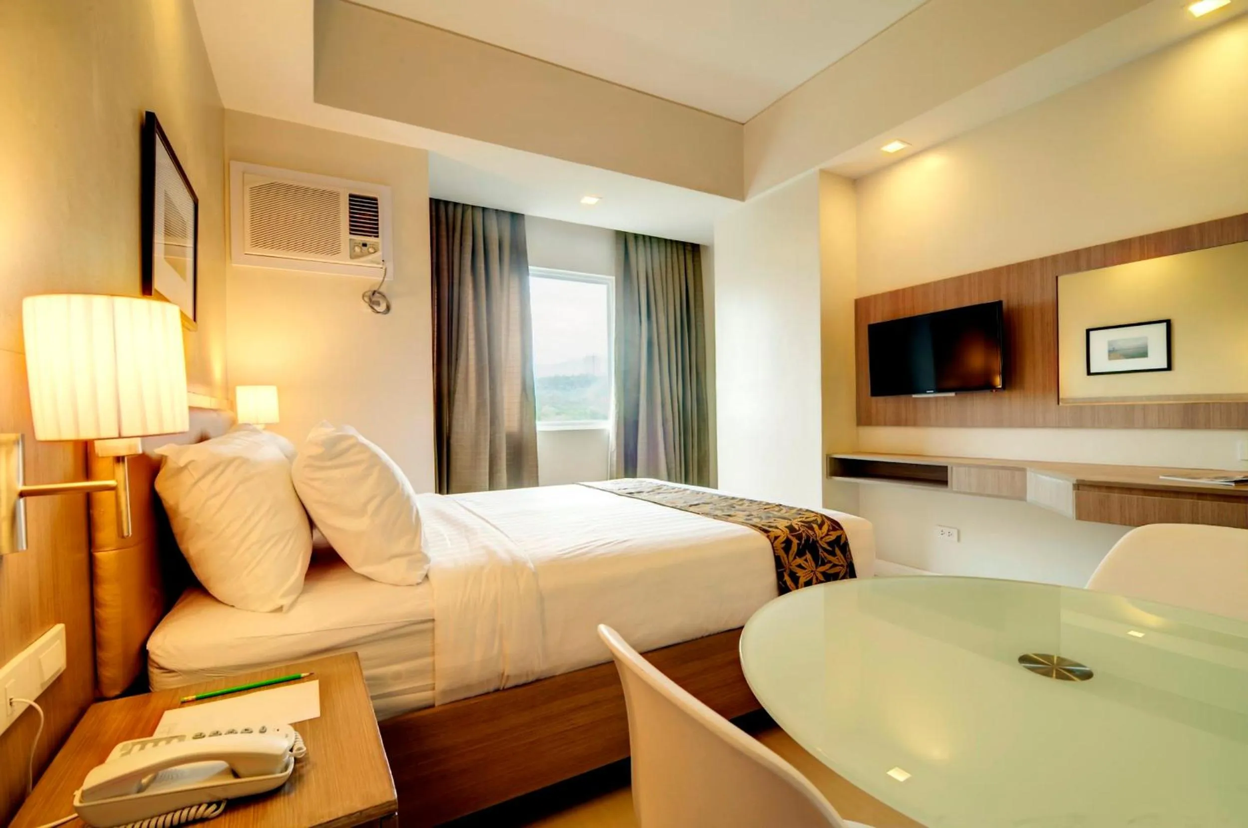 Photo of the whole room, Bed in Zerenity Hotel & Suites