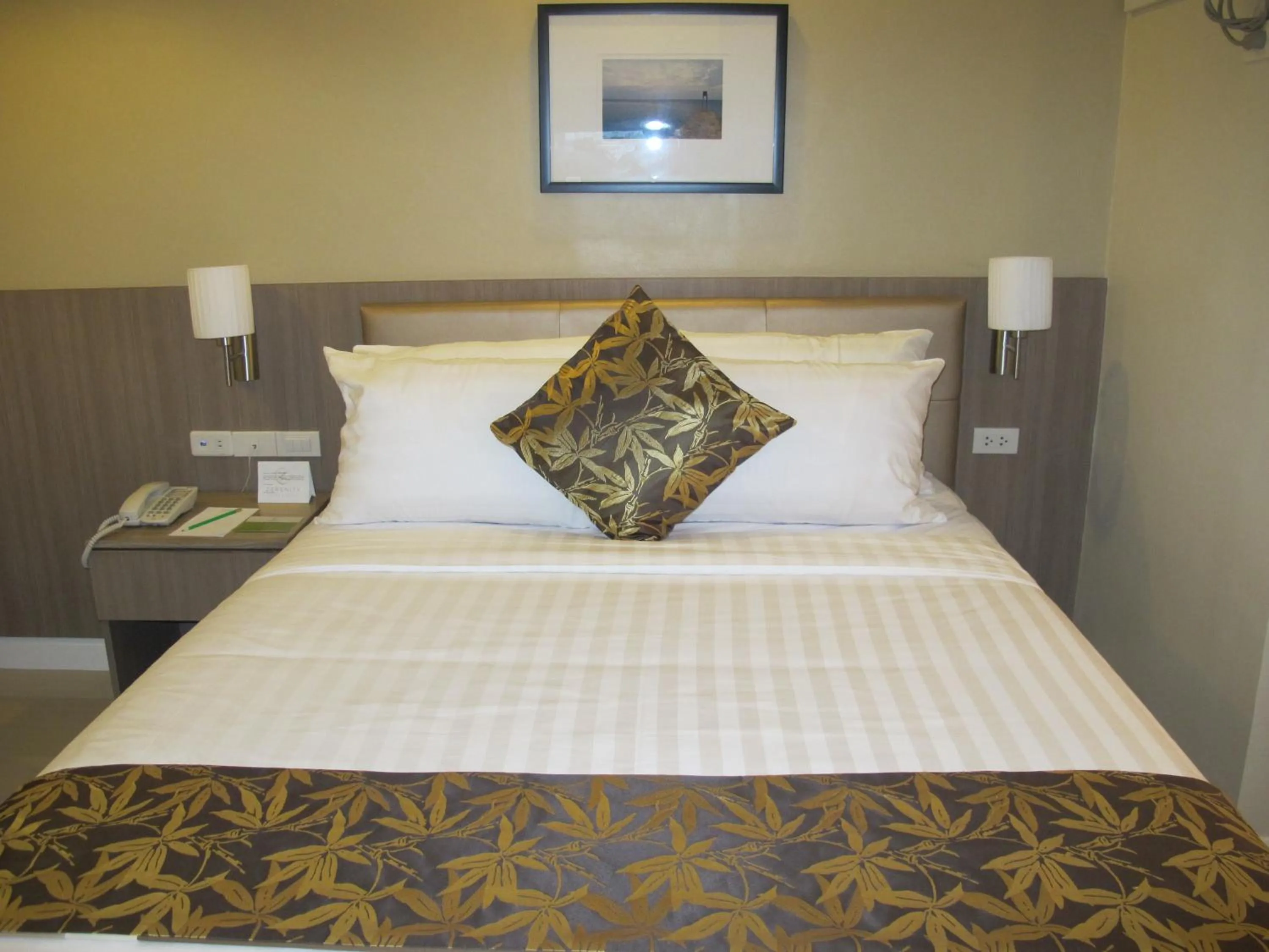 Photo of the whole room, Bed in Zerenity Hotel & Suites
