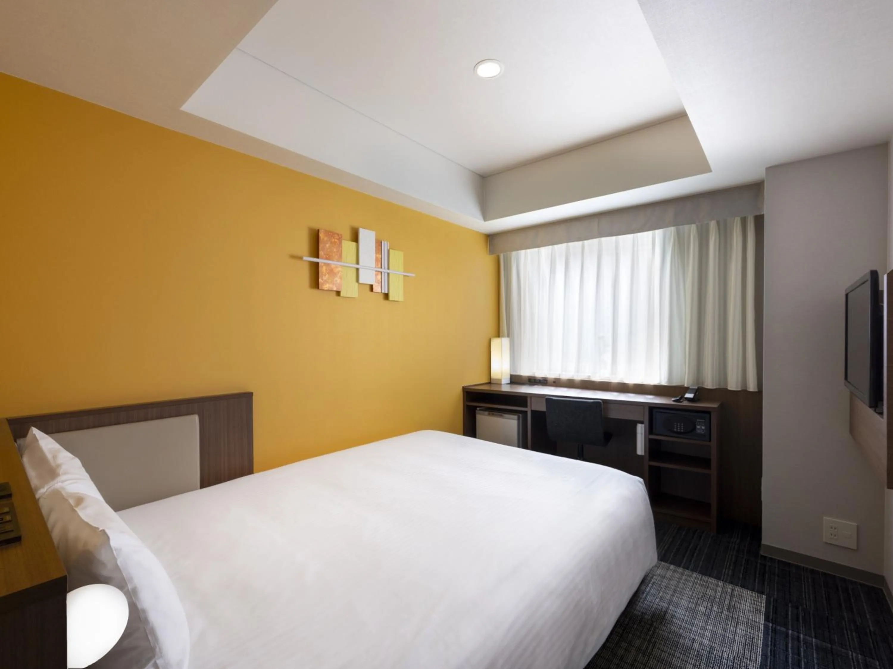 Bed in ibis Styles Kyoto Shijo