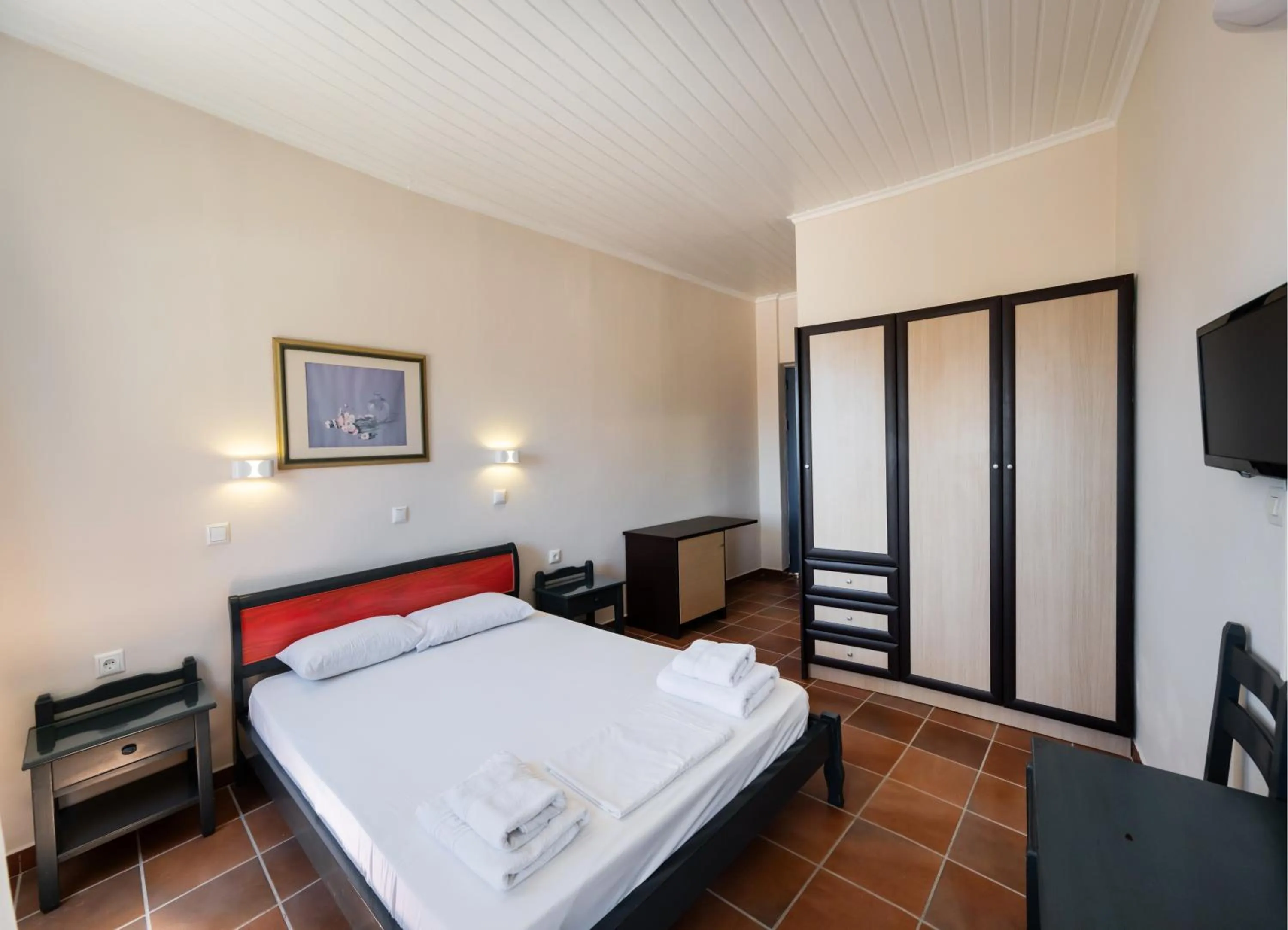 TV and multimedia, Bed in Ionio Hotel