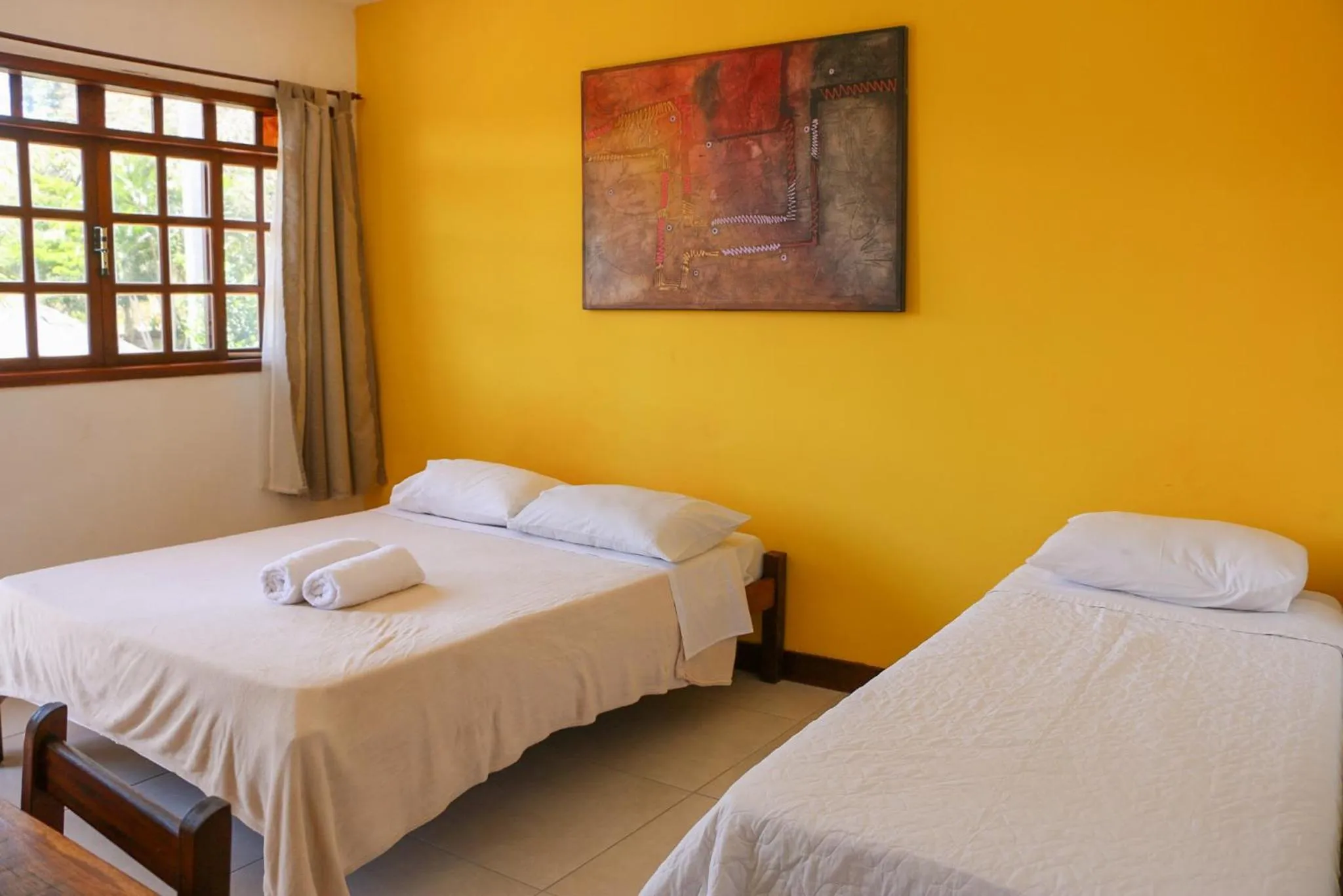 Bed in POUSADA ELOHIM DE BUZIOS