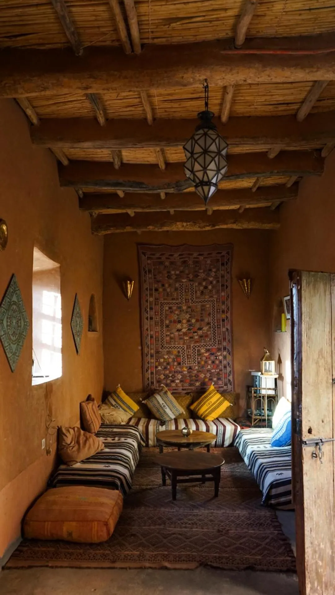 Communal lounge/ TV room, Bed in Kasbah Tigmi El Janoub