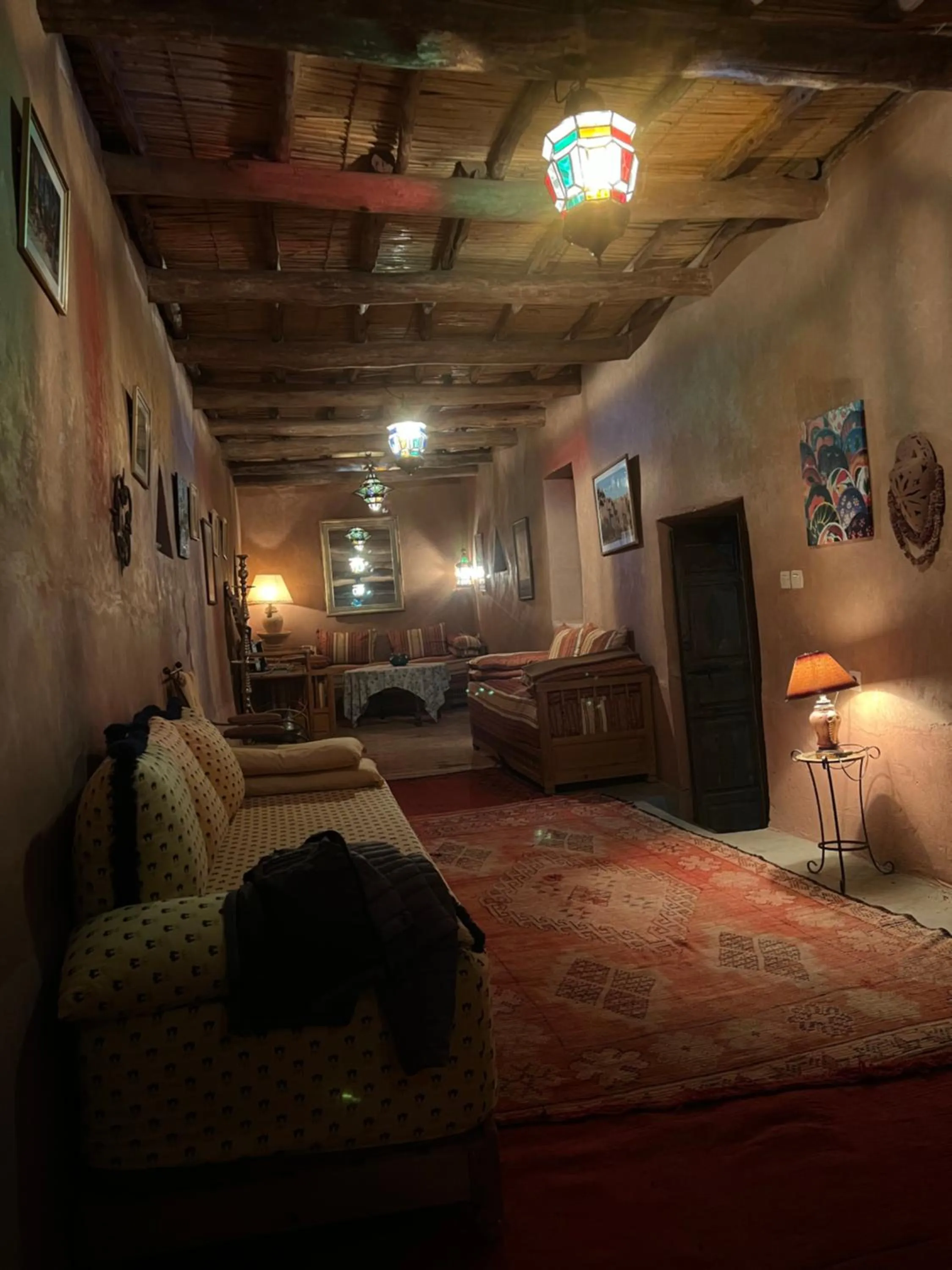 Communal lounge/ TV room, Bed in Kasbah Tigmi El Janoub