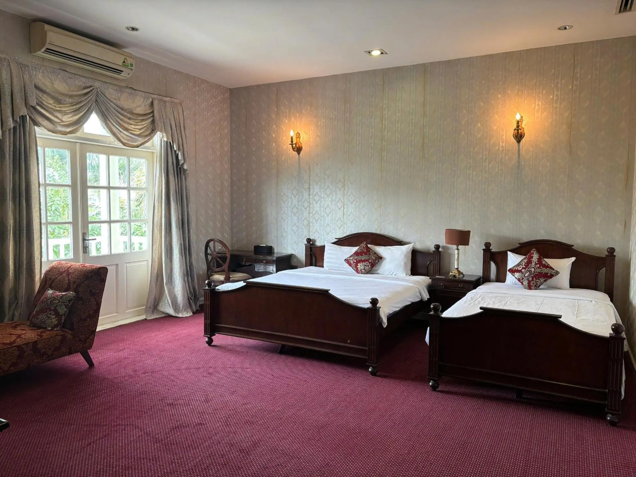 Bedroom in Hidden Mansions Saigon Resort