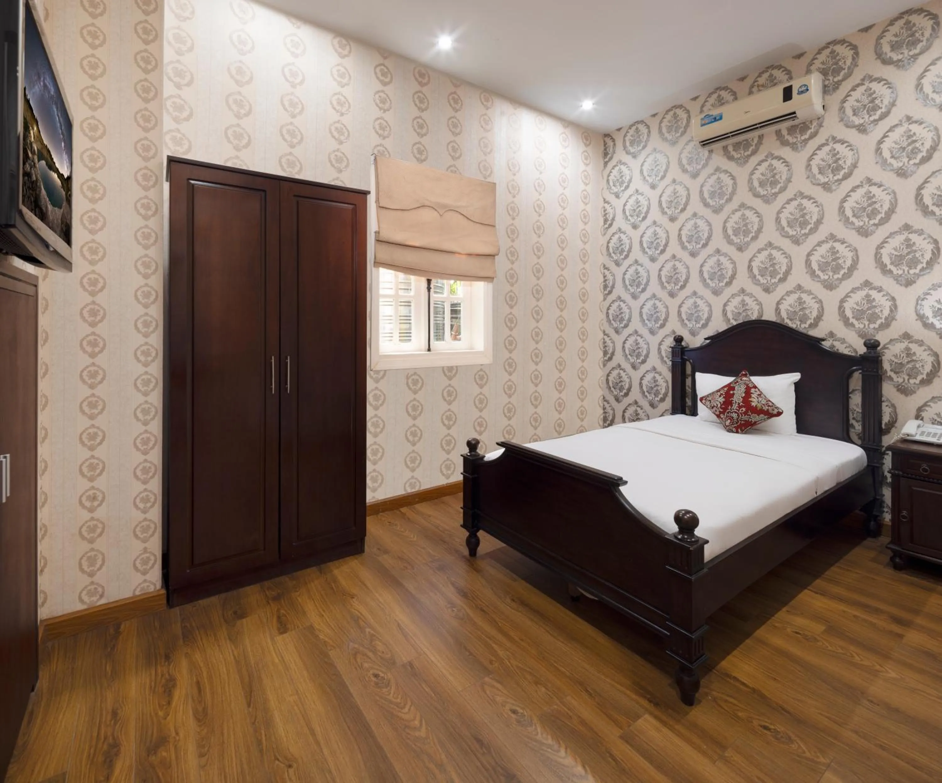 Bedroom in Hidden Mansions Saigon Resort