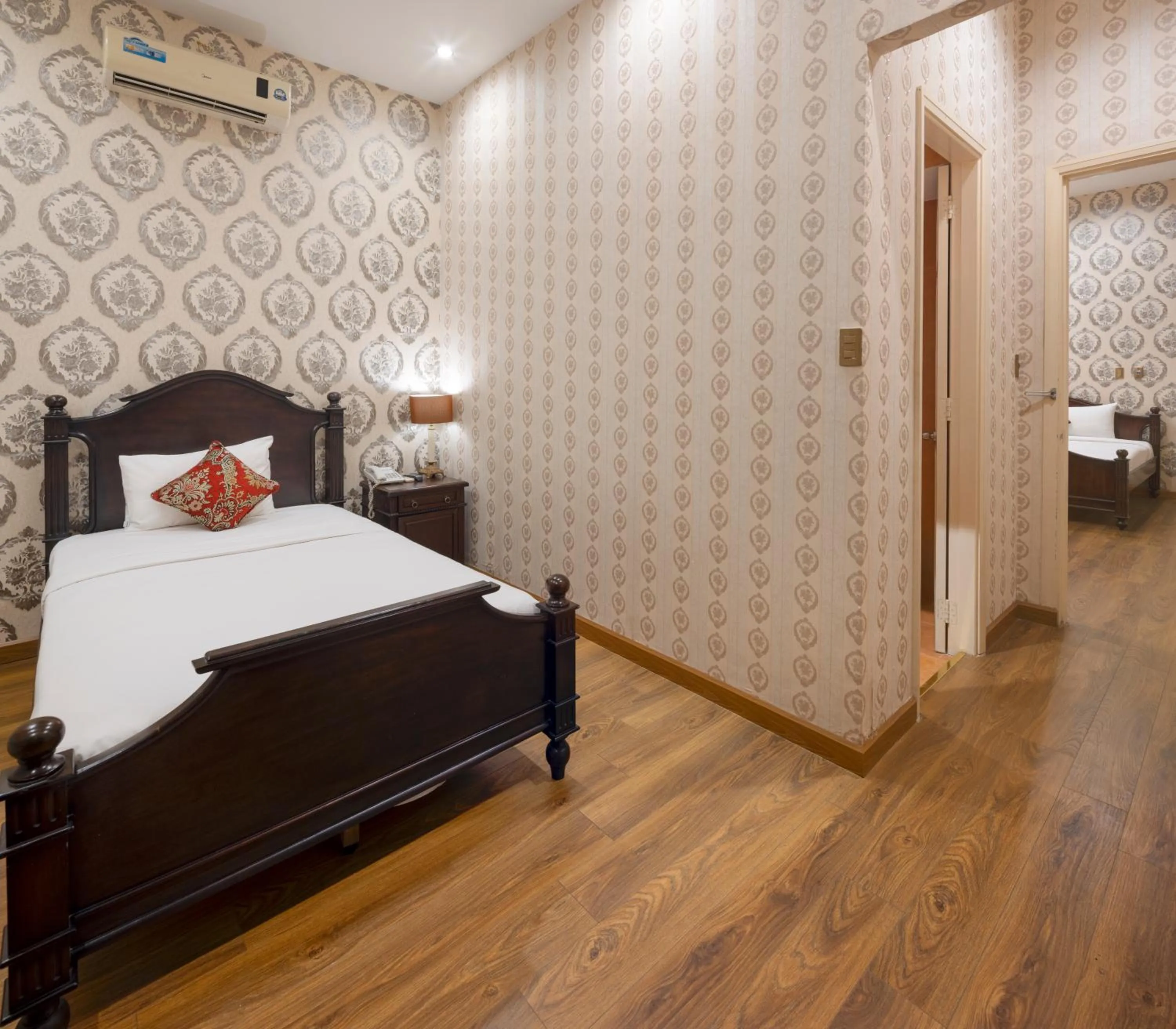 Bedroom in Hidden Mansions Saigon Resort