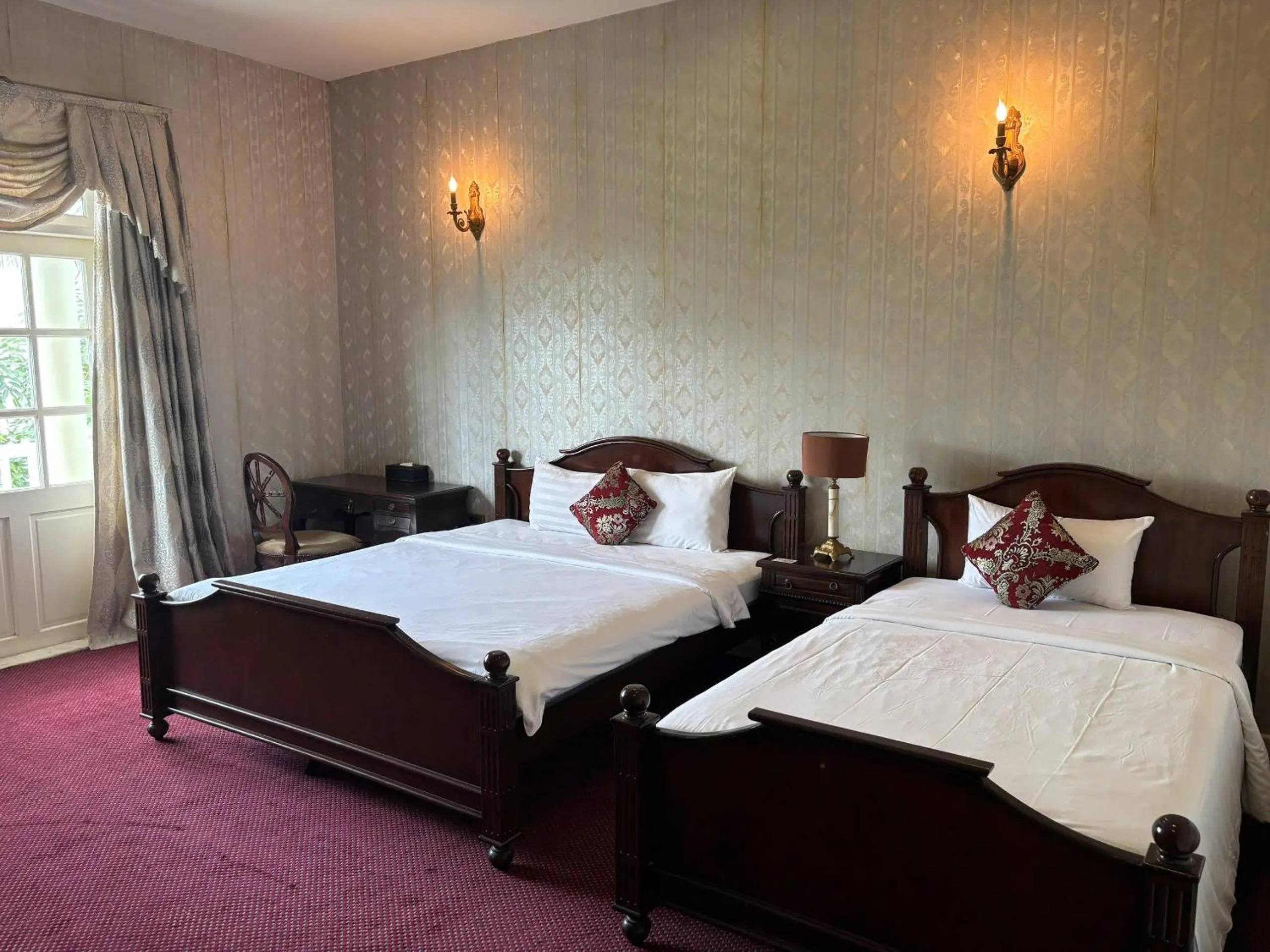 Bedroom in Hidden Mansions Saigon Resort