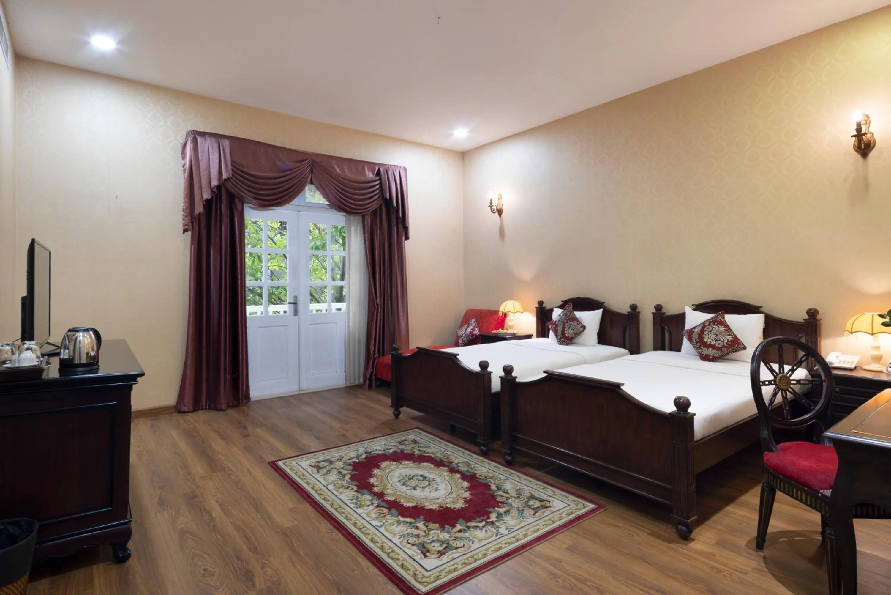 Bed in Hidden Mansions Saigon Resort