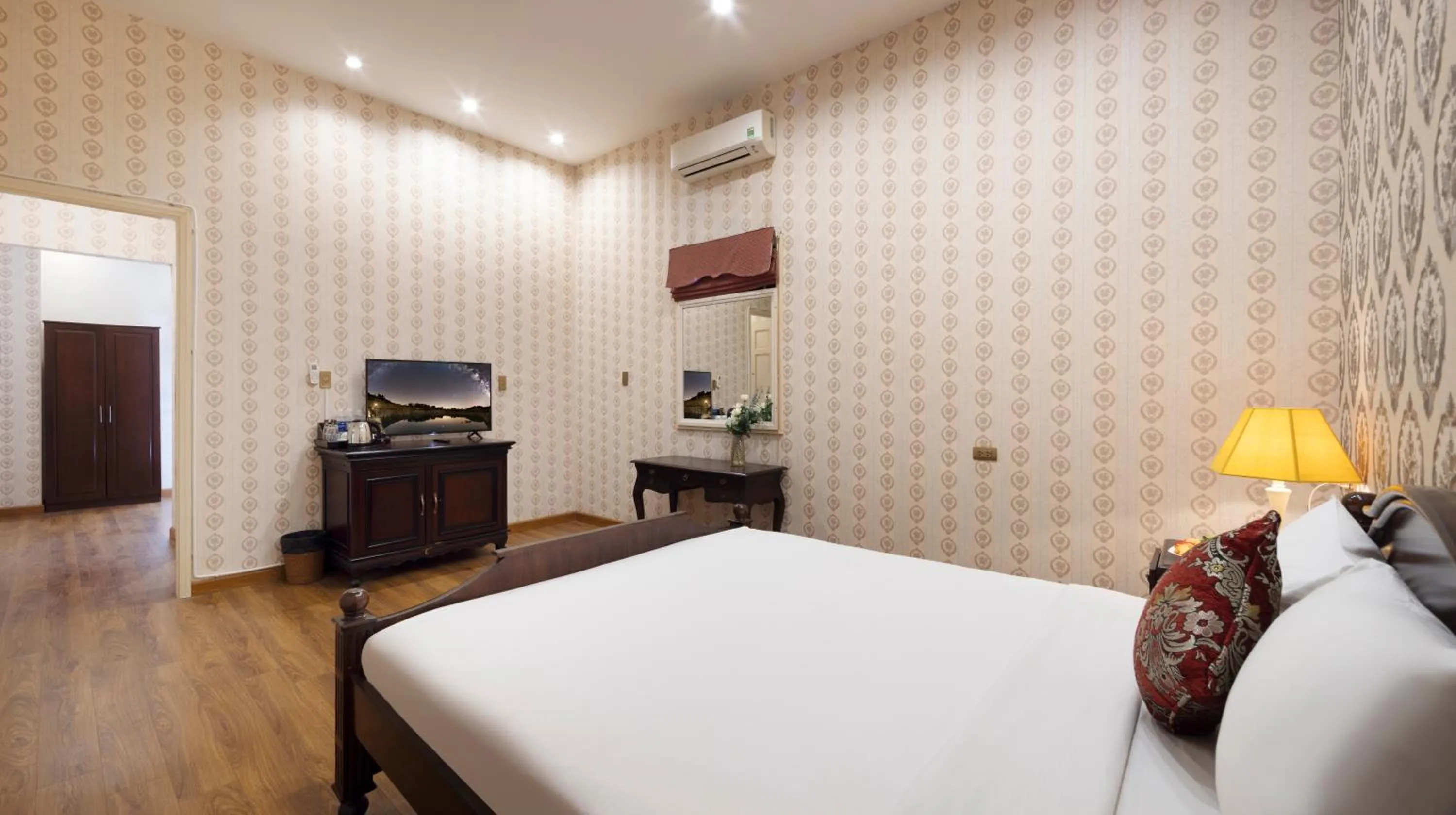 Bedroom in Hidden Mansions Saigon Resort