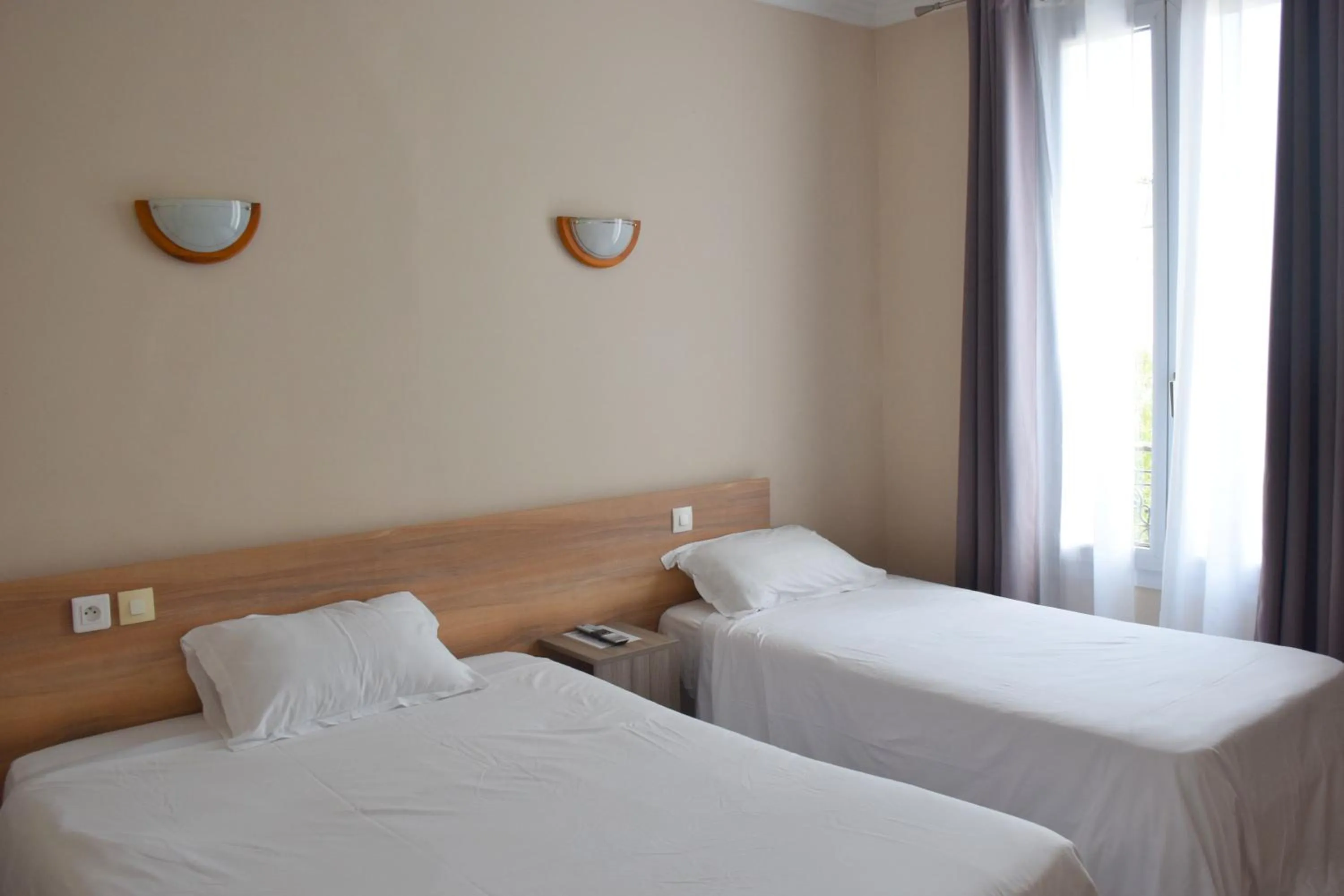 Bed in Hôtel Résidence Champerret