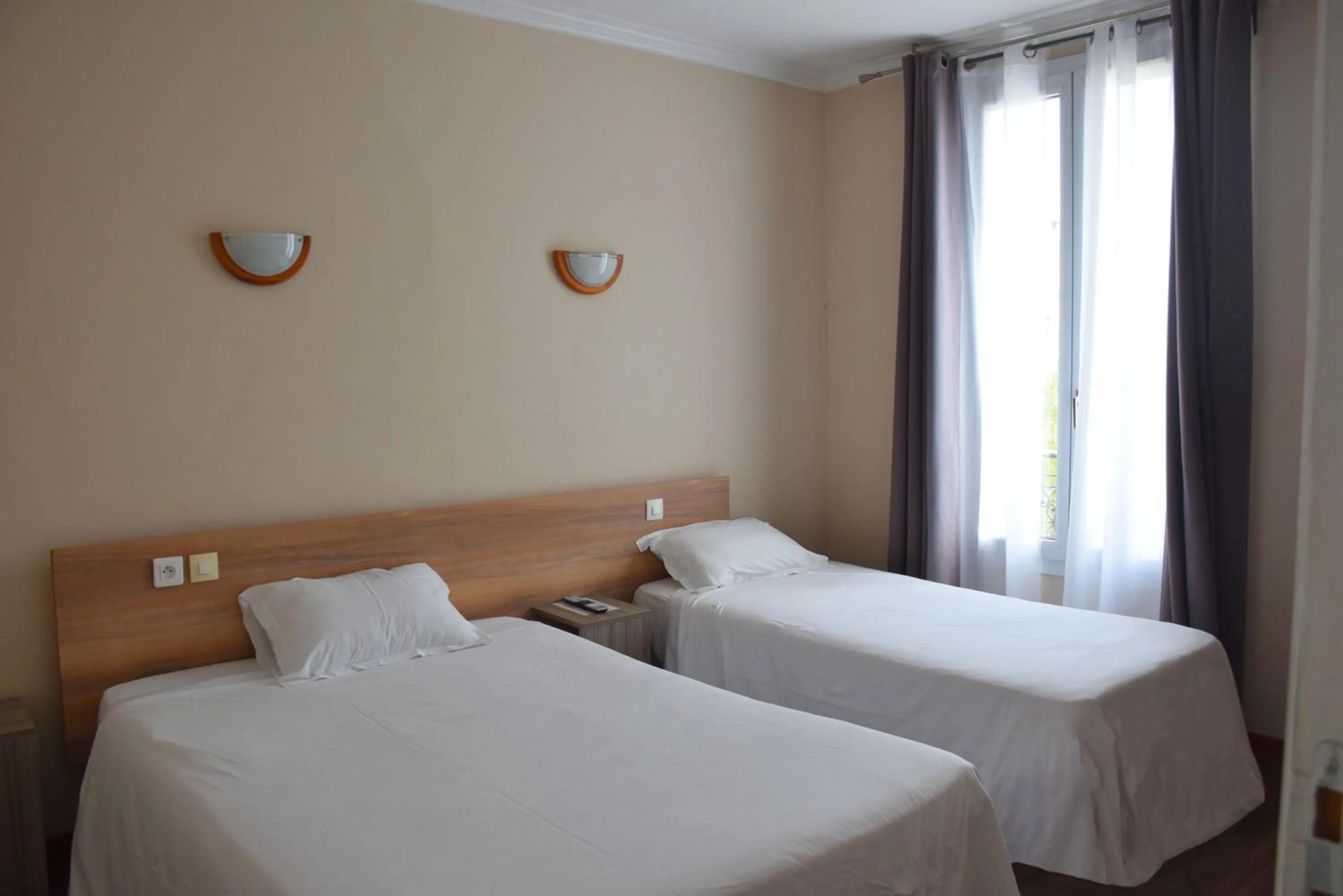 Bed in Hôtel Résidence Champerret