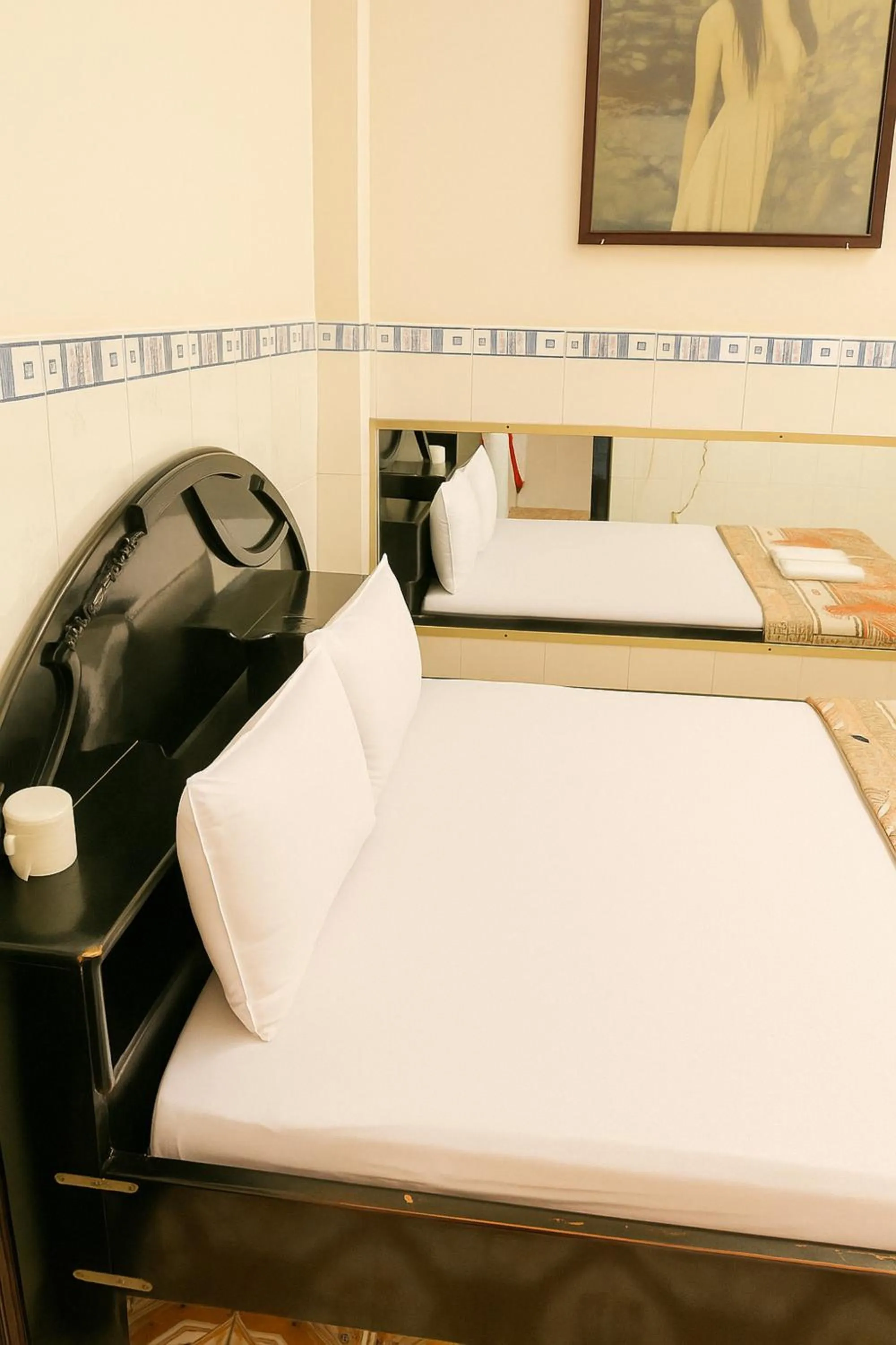 Photo of the whole room, Bed in QUỲNH HOA HOTEL