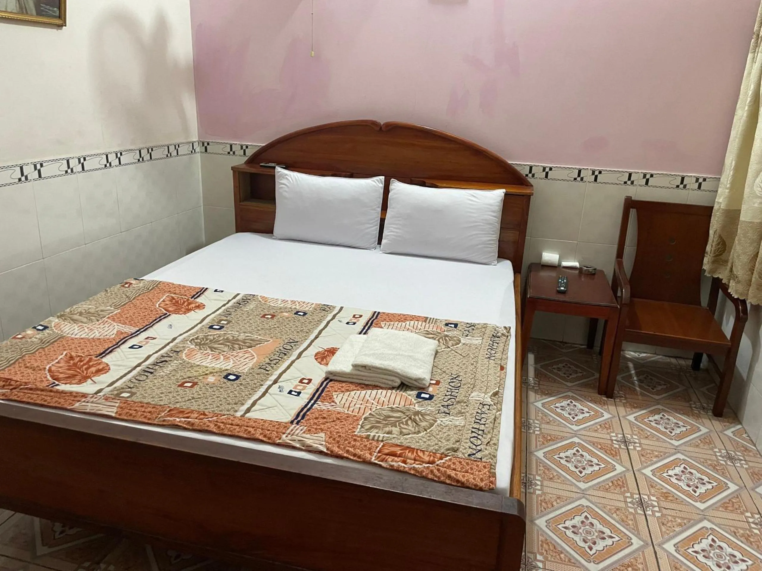 Bed in QUỲNH HOA HOTEL