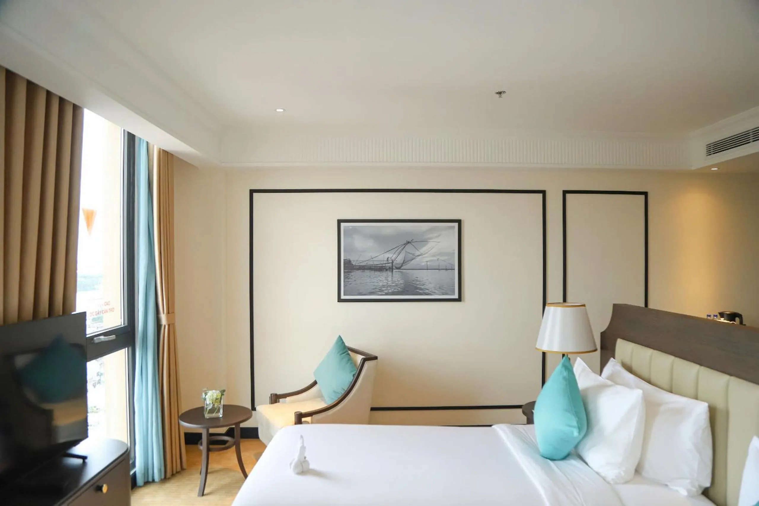 Bed in Charmant Suites a Boutique Hotel Can Tho