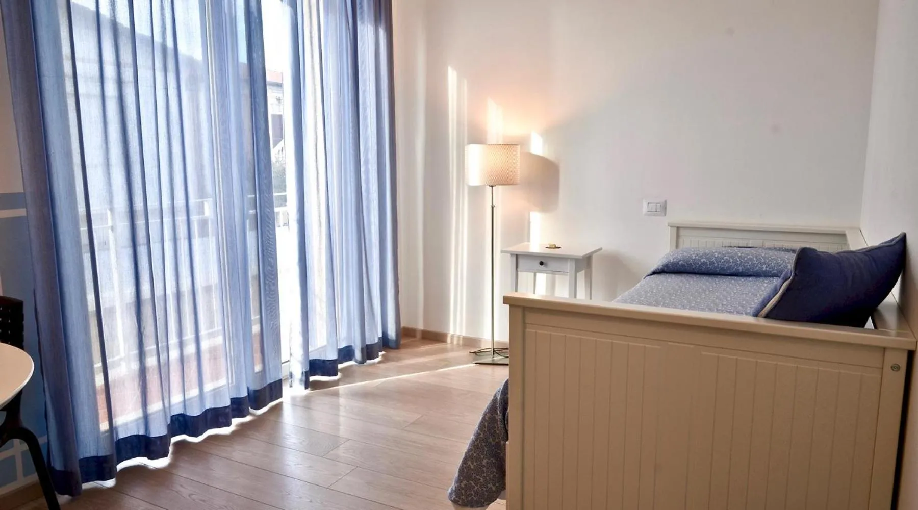 Photo of the whole room, Bed in Petit Hotel