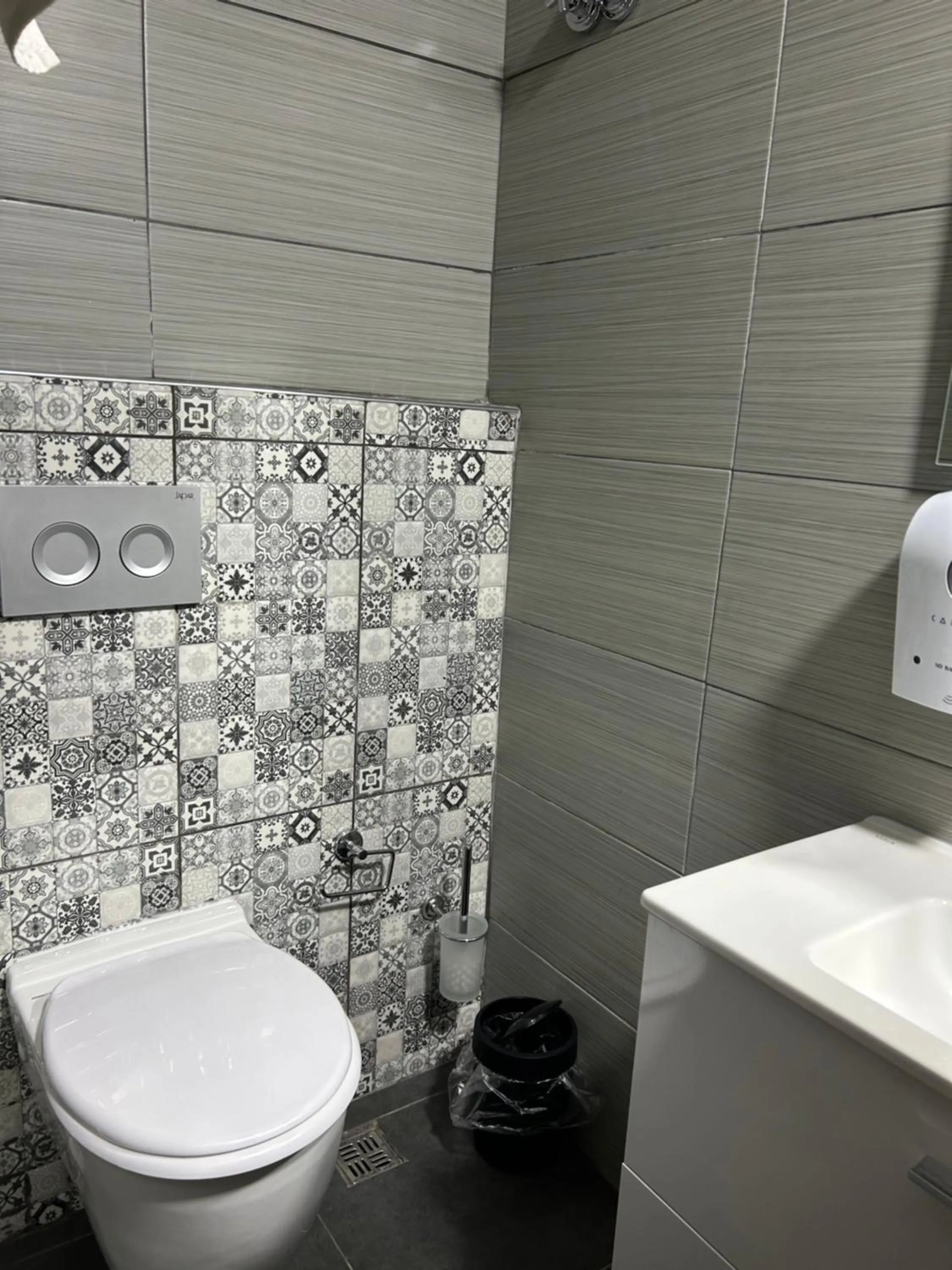 Toilet in Cord Hotel & Resort