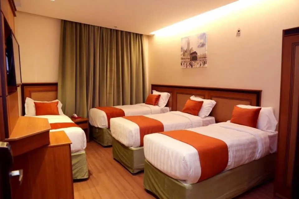 Bed in Al Bostan Al Masi Hotel