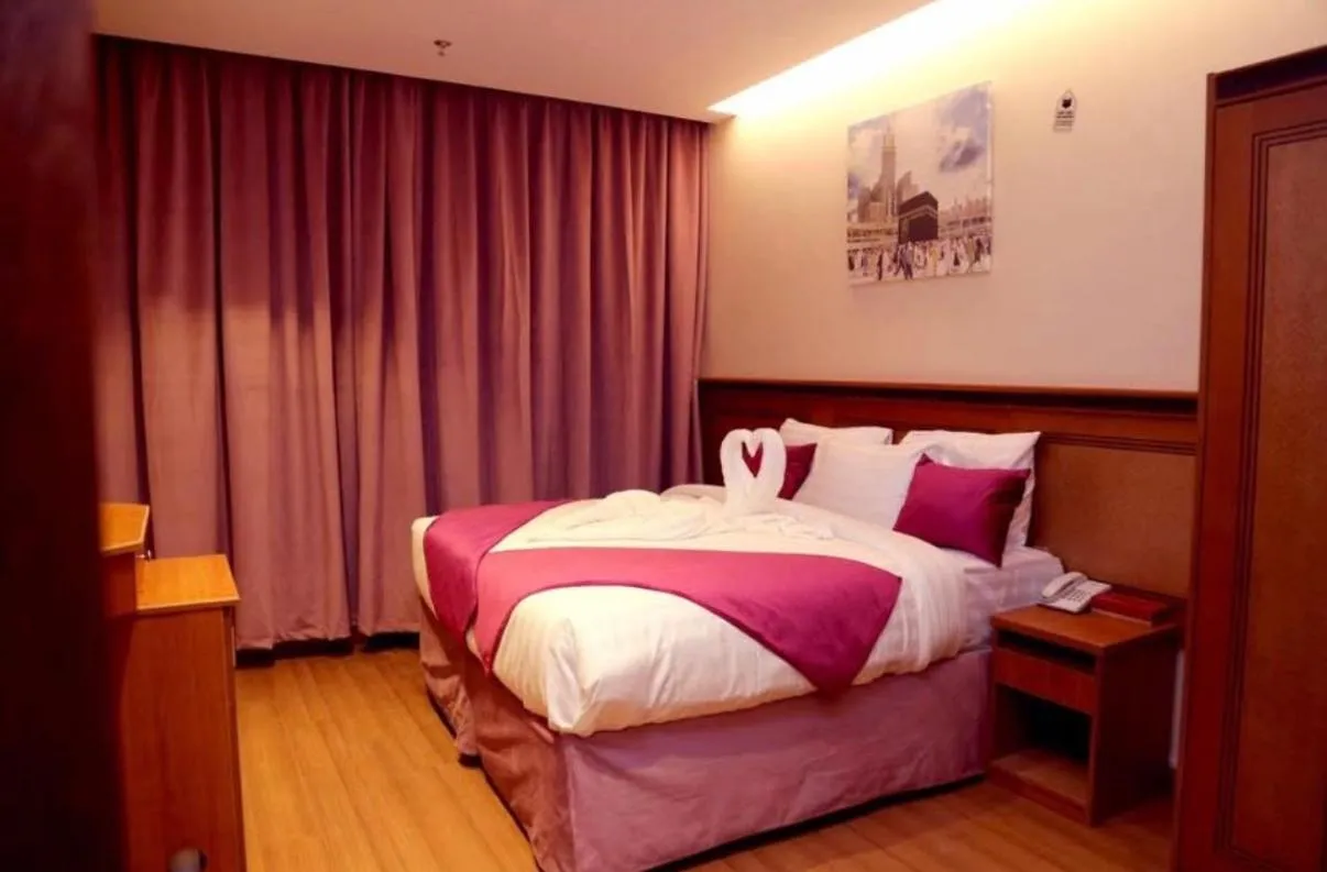 Bed in Al Bostan Al Masi Hotel