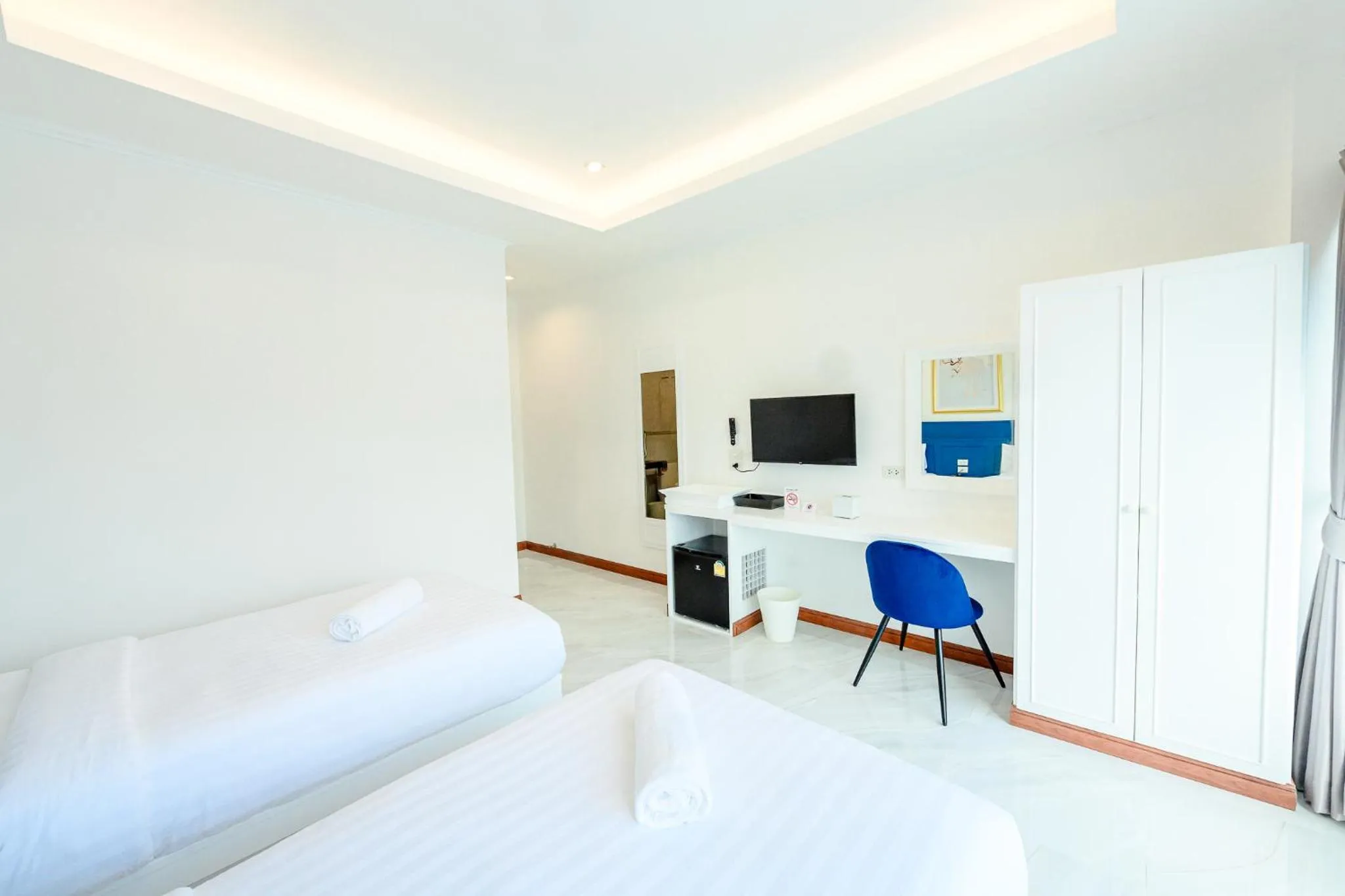 Bed in Marble Arch De Loei Hotel