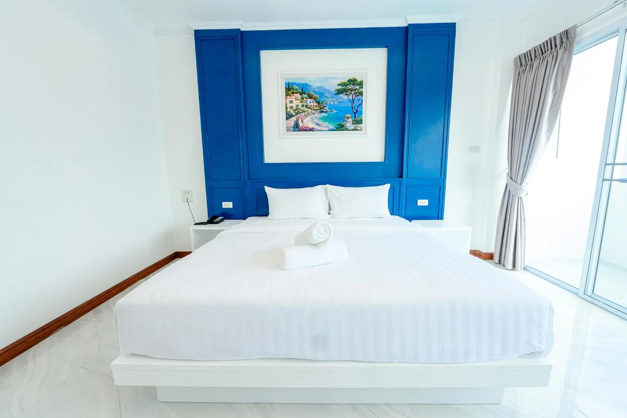 Bed in Marble Arch De Loei Hotel