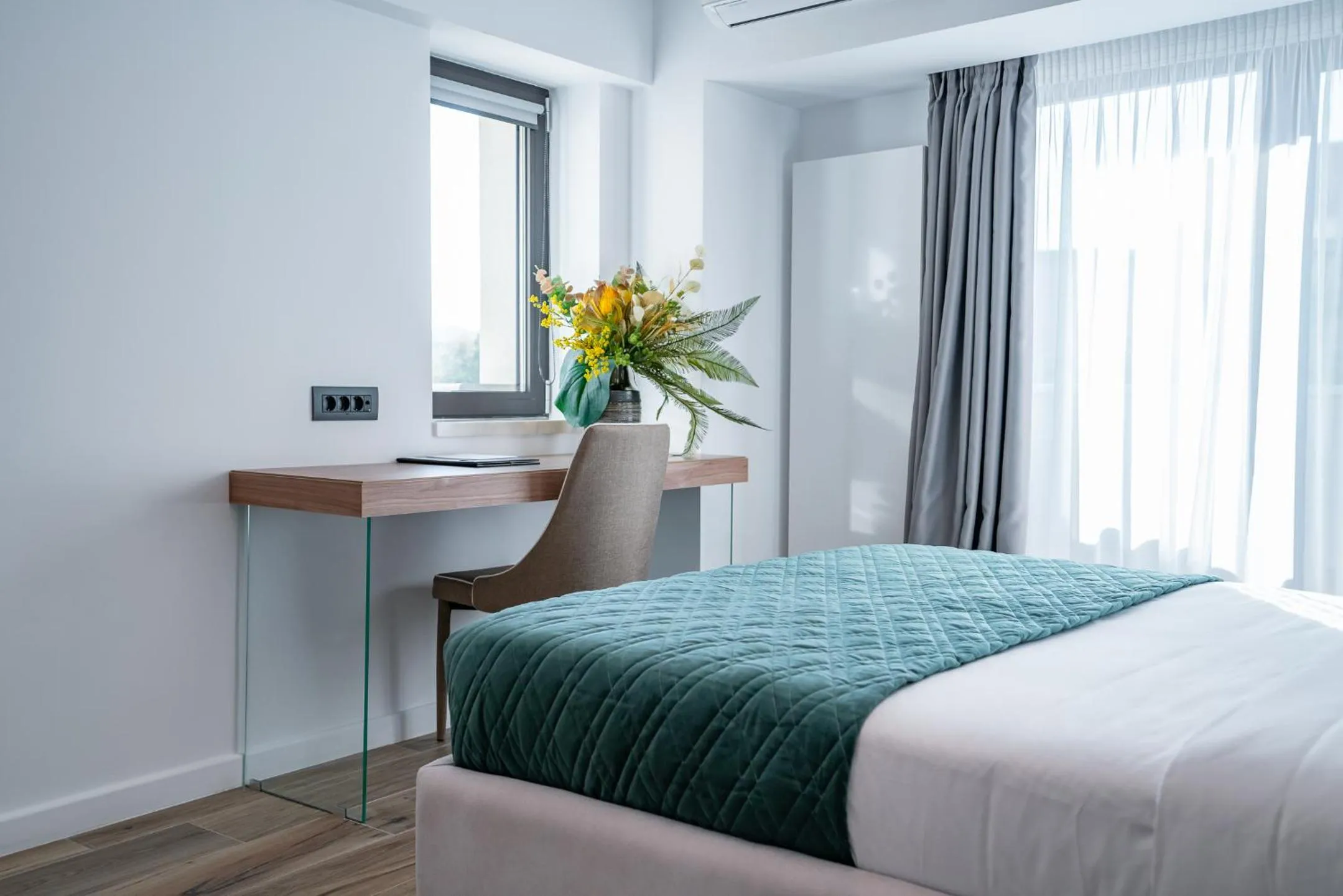 Bed in NOVOS ApartHotel