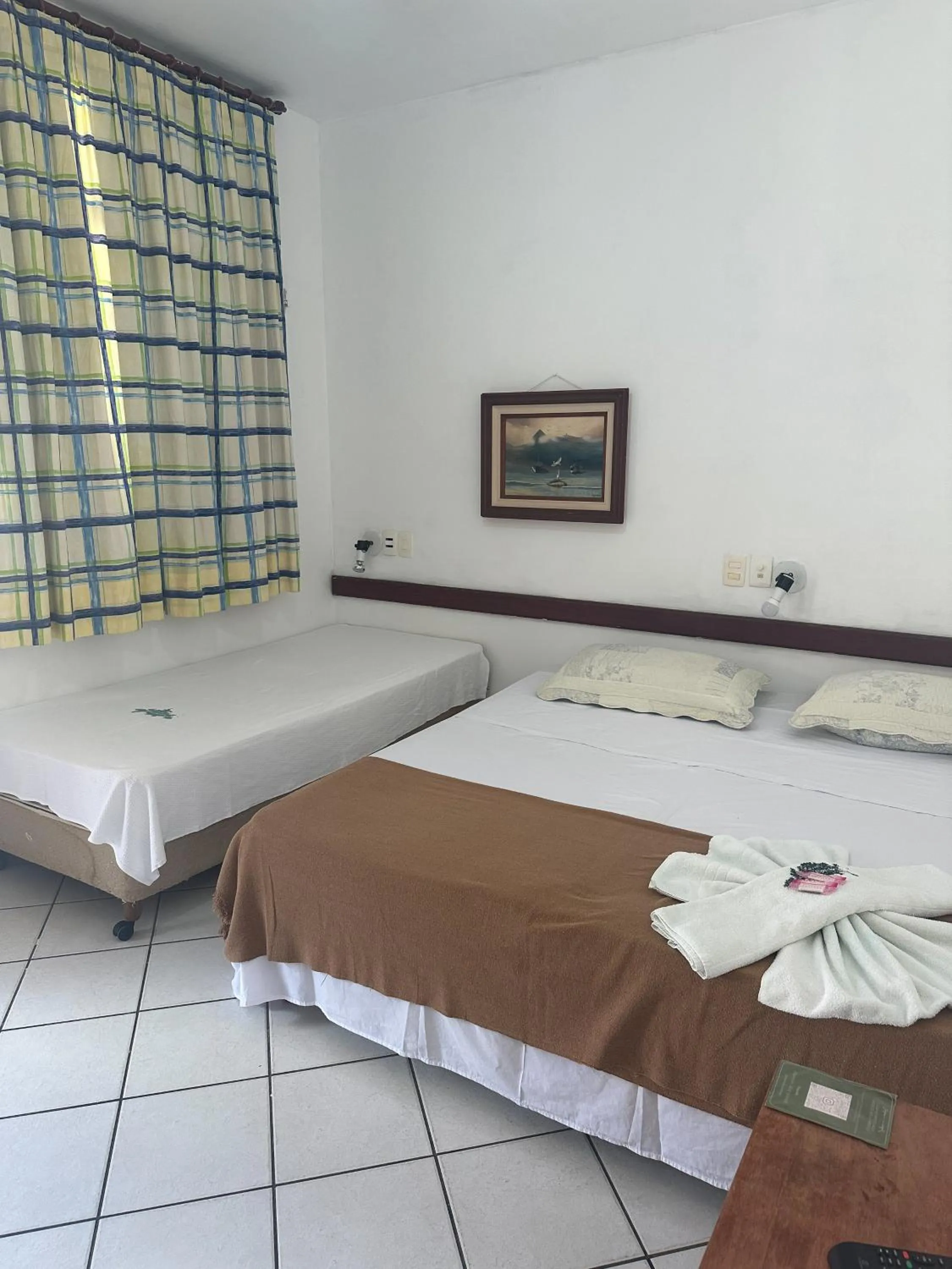 Bed in Pousada Paraíso Ilha Grande