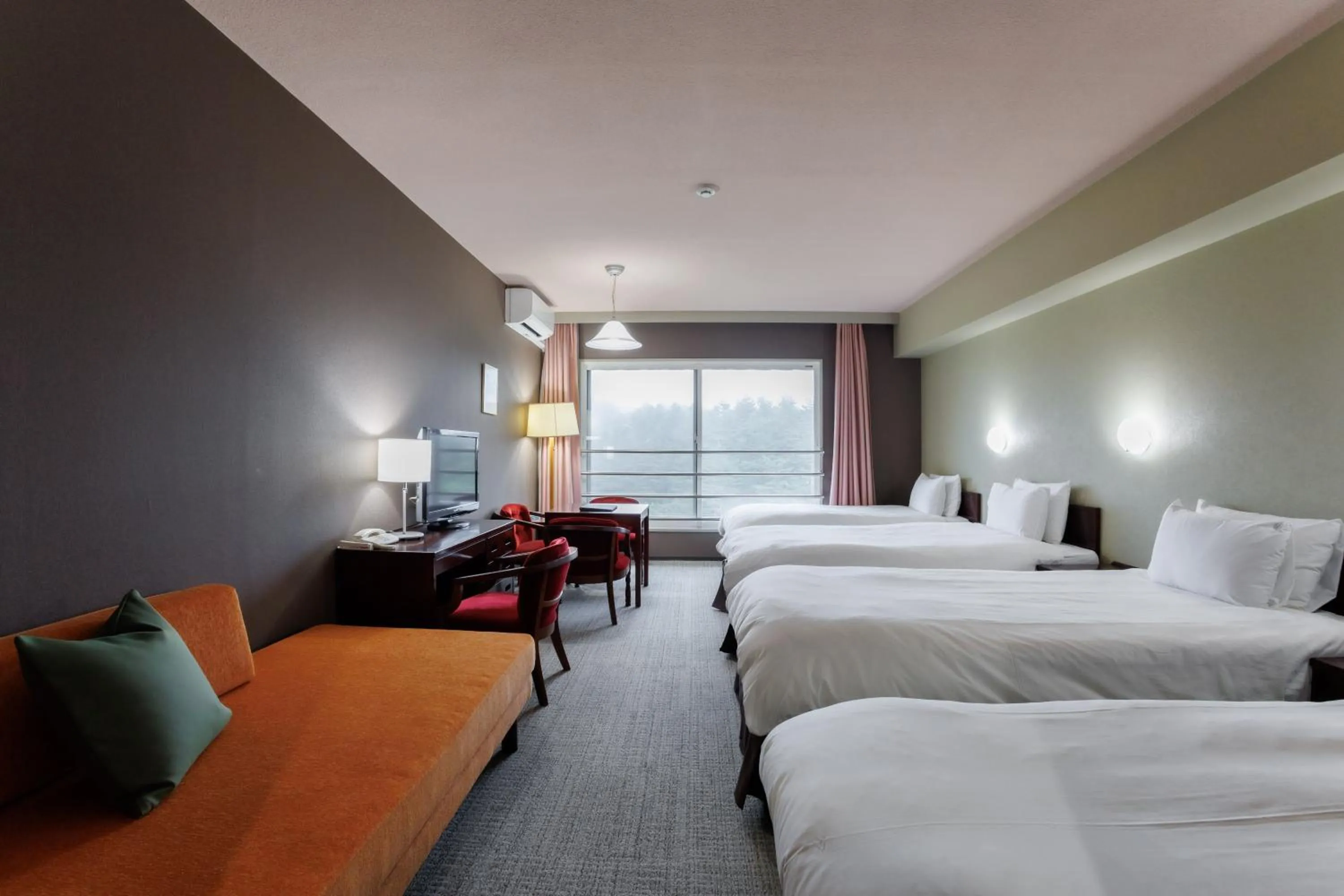 Bed in Tsumagoi Prince Hotel