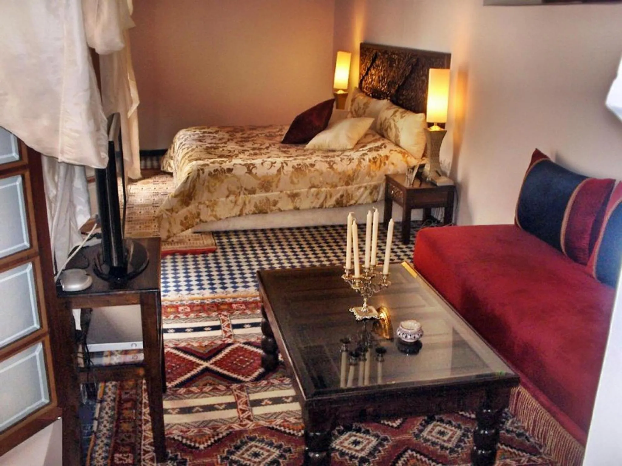 Photo of the whole room, Bed in Riad Noujoum Medina