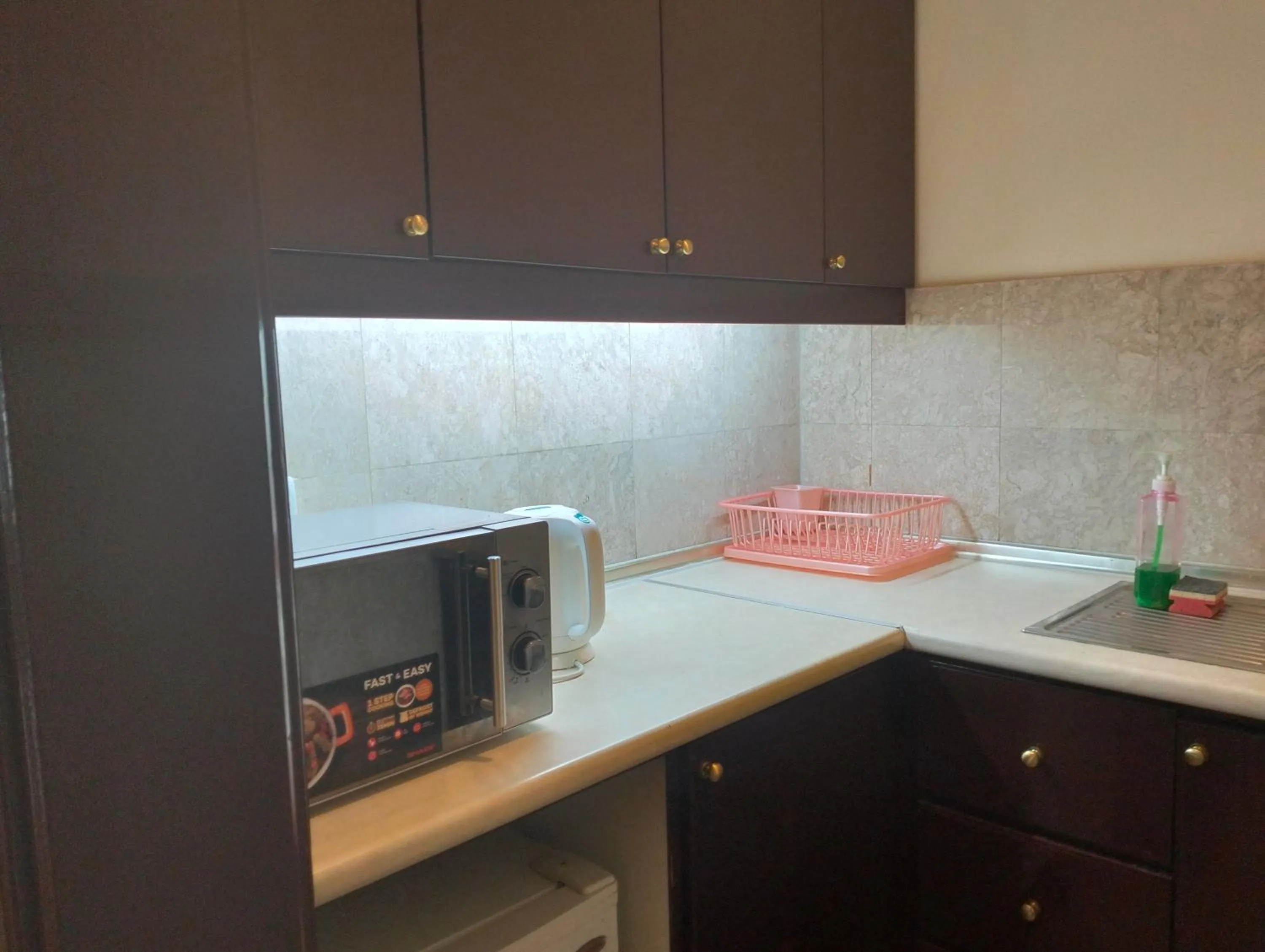 Kitchen or kitchenette in Luxy Service Apartment at Times Square KL