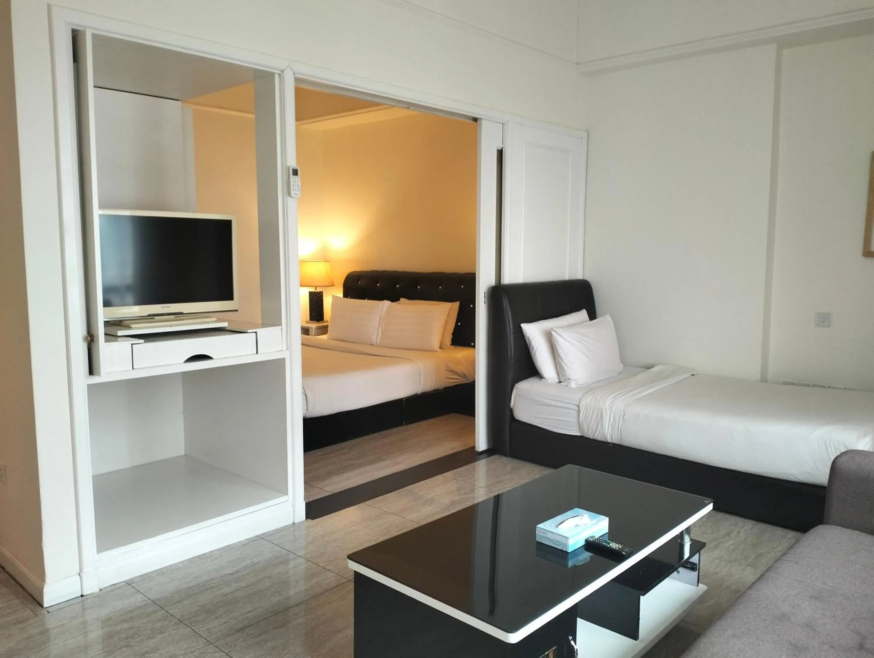 Communal lounge/ TV room in Luxy Service Apartment at Times Square KL