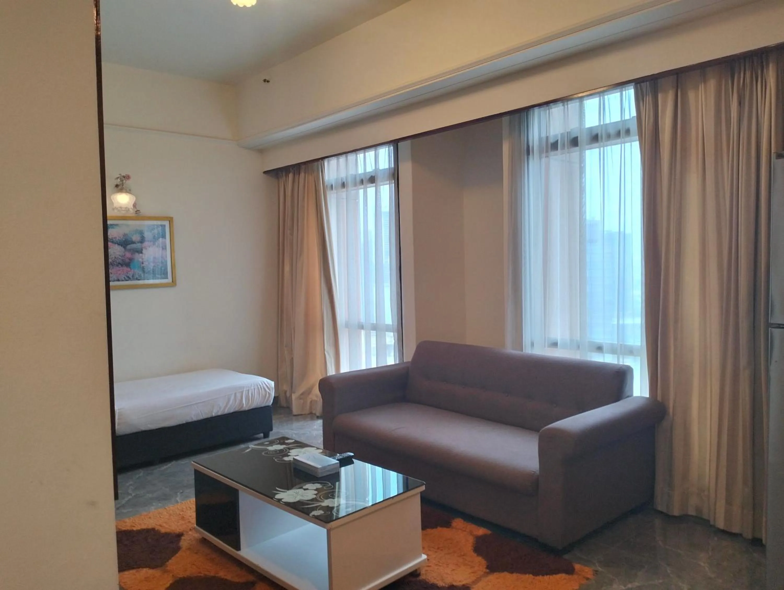 Living room in Luxy Service Apartment at Times Square KL