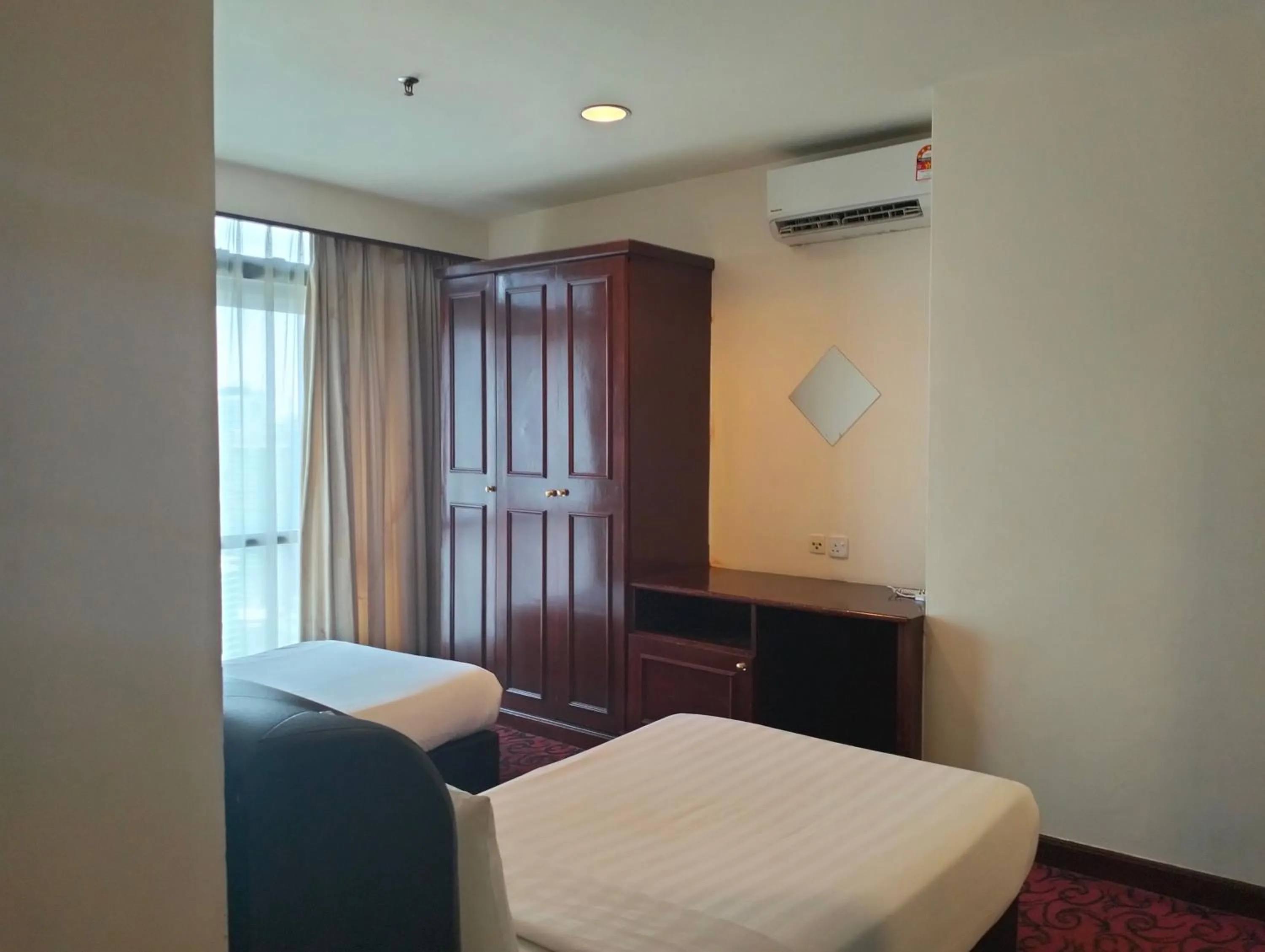 Bed in Luxy Service Apartment at Times Square KL