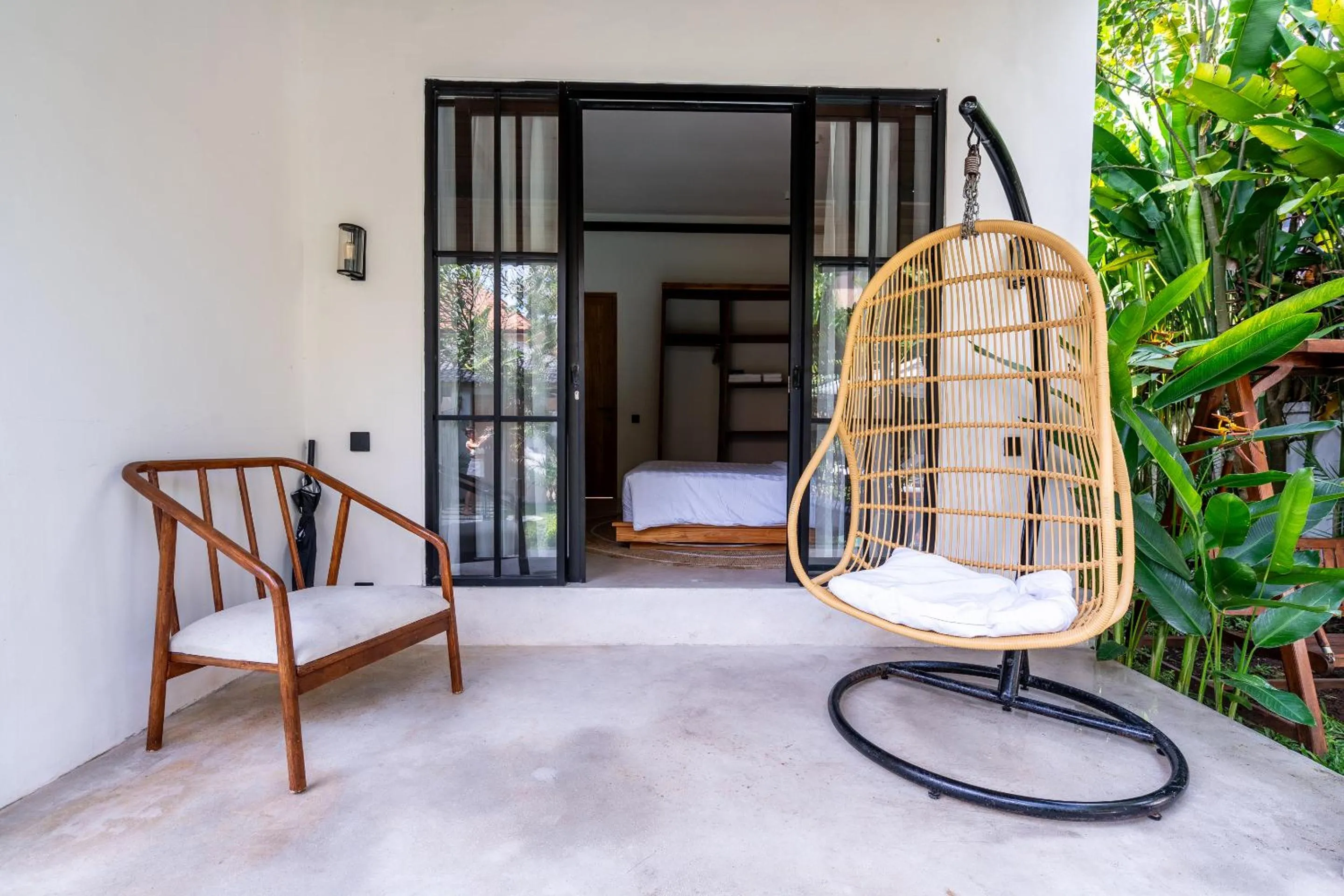 Balcony/Terrace in Hijau Villa by EVDEkimi - Charming 2BR escape with Pool, Outdoor Lounge, Lush Garden - New Year's Offer