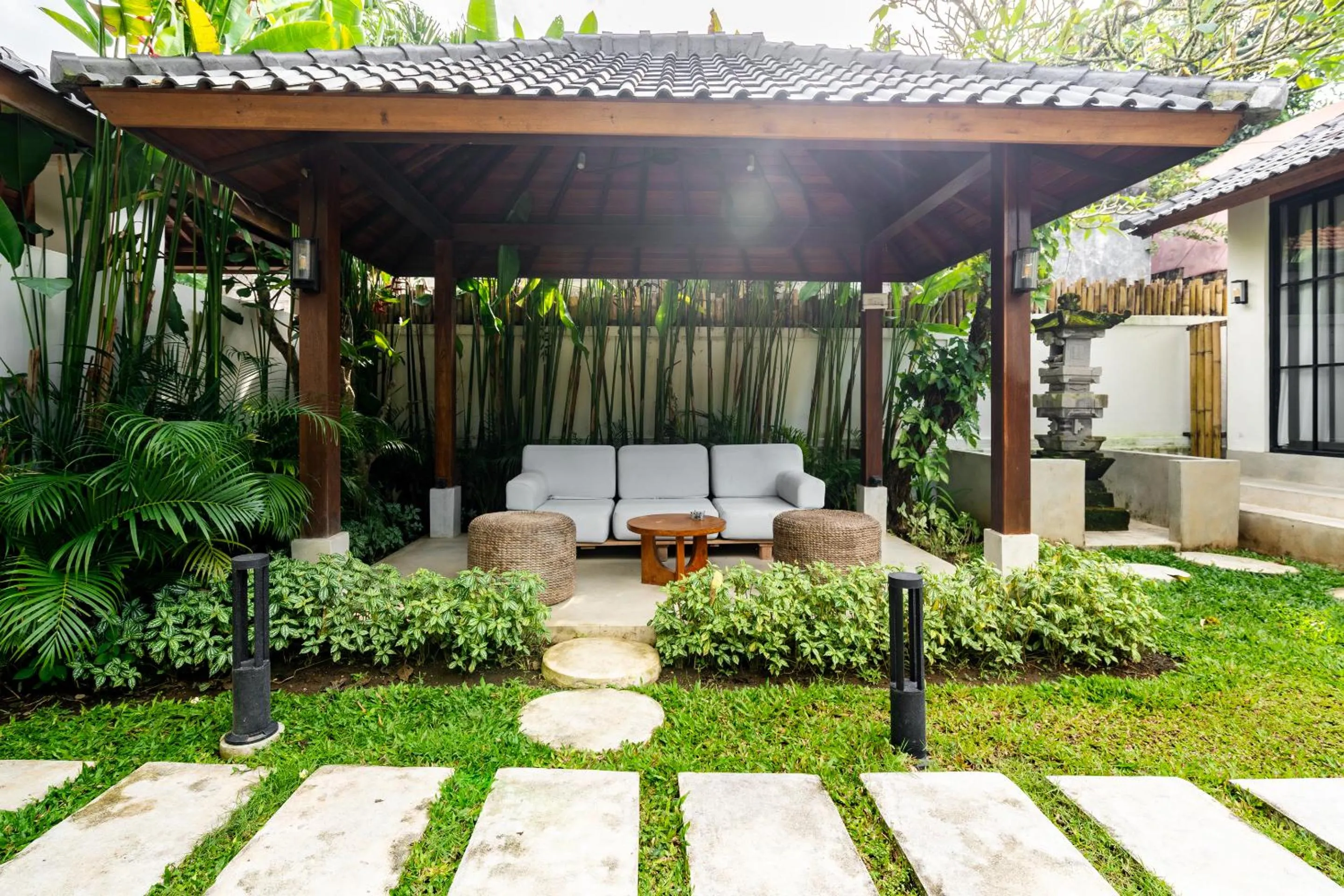 Garden in Hijau Villa by EVDEkimi - Charming 2BR escape with Pool, Outdoor Lounge, Lush Garden - New Year's Offer