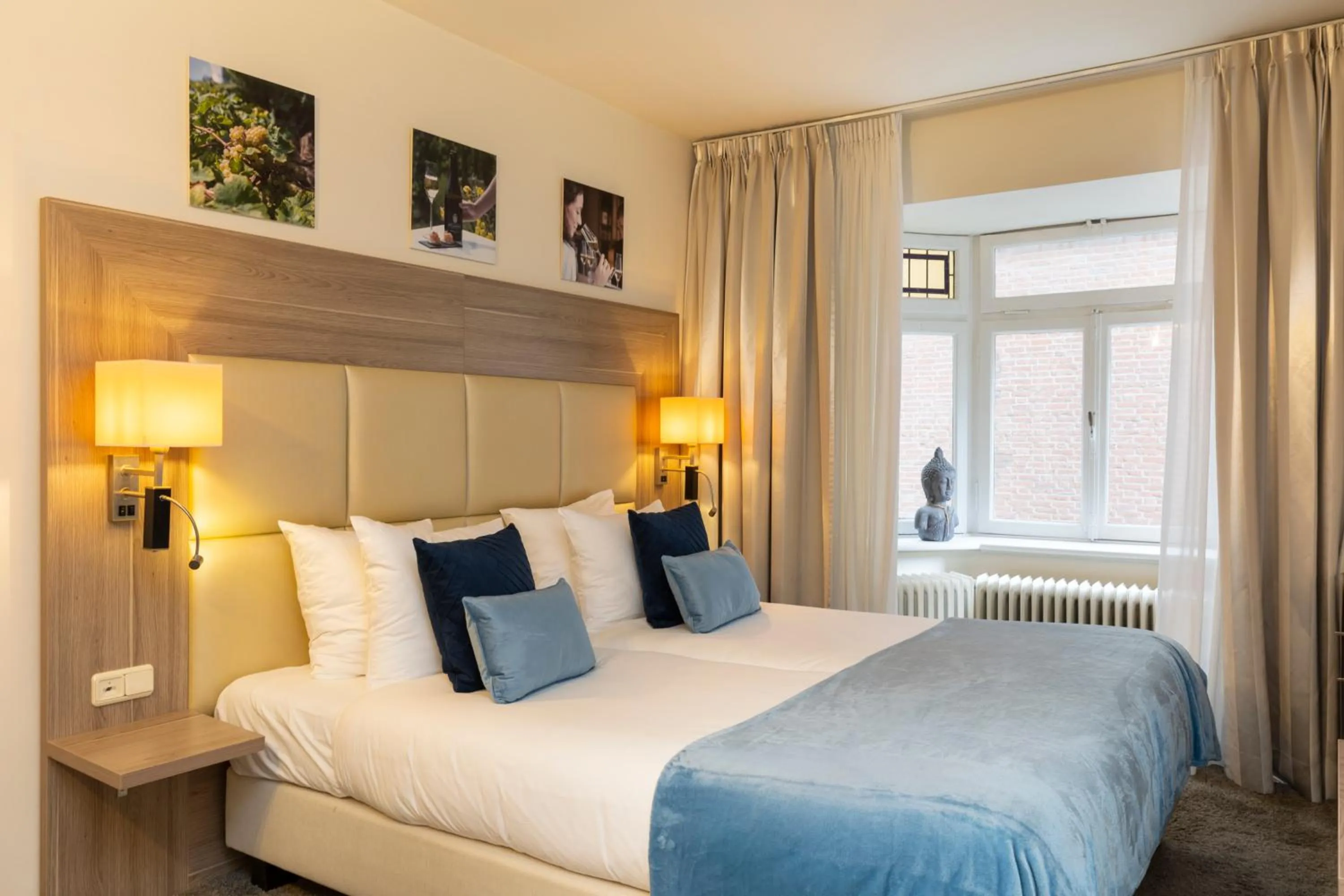 Bed in Dormio Wijnhotel Valkenburg