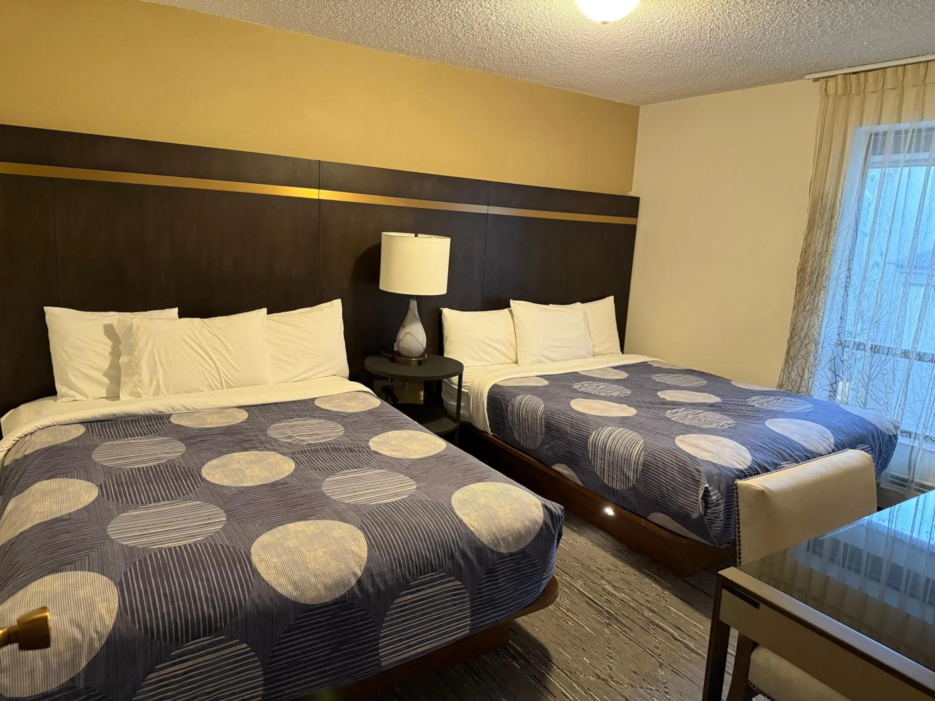 Bed in Snowshoe Motel