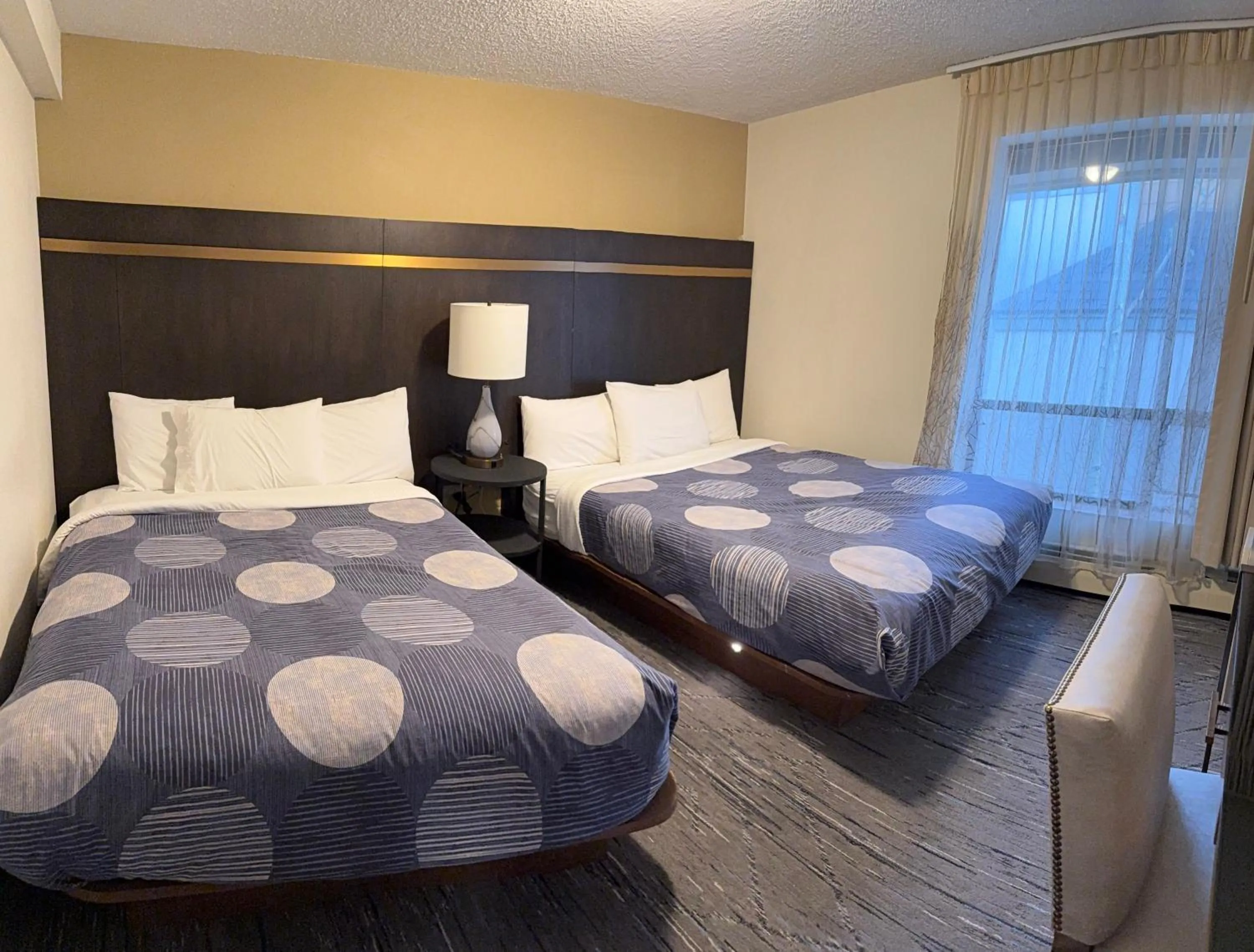 Bed in Snowshoe Motel