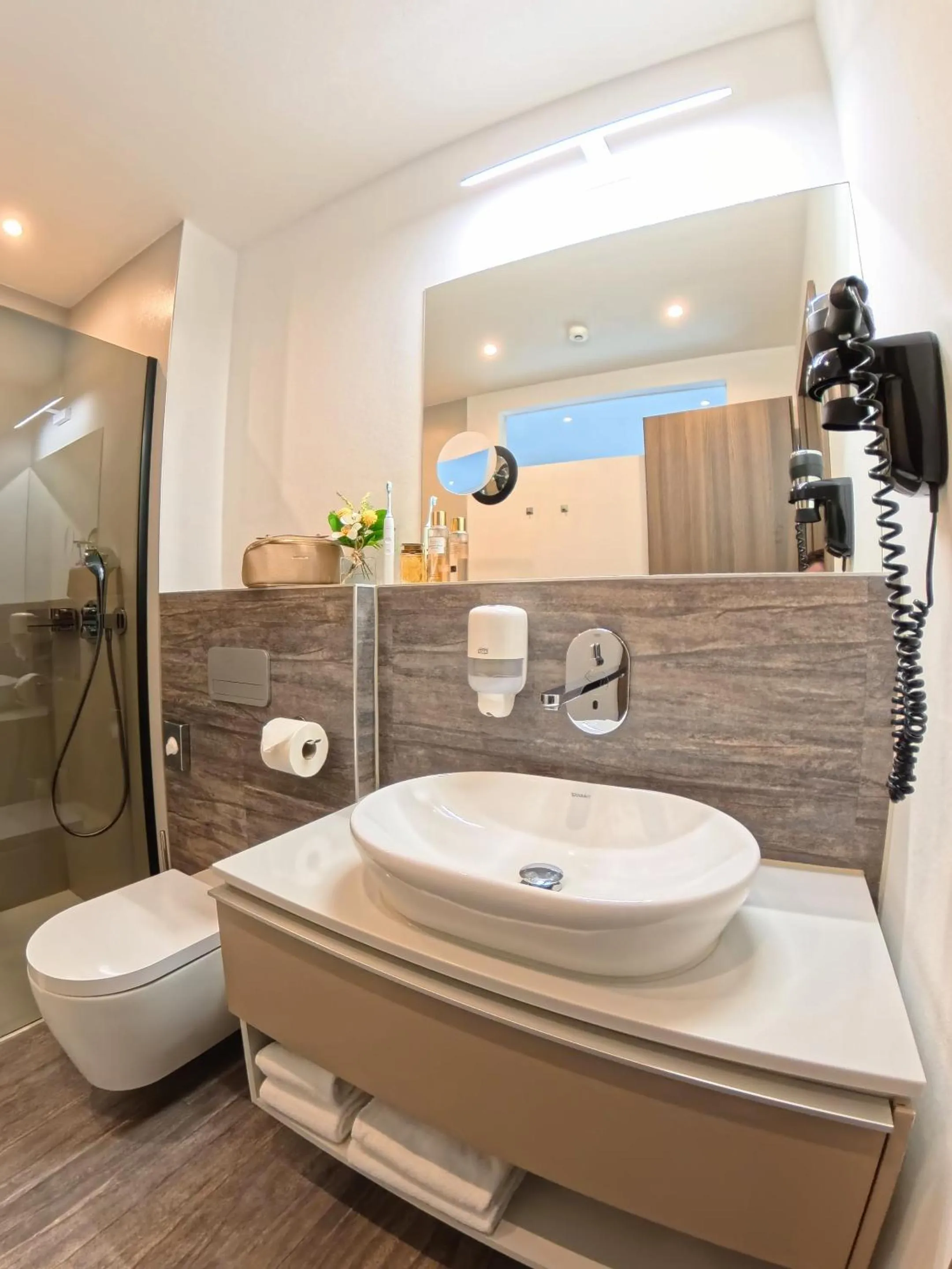 Bathroom in NOVERA Aparthotel