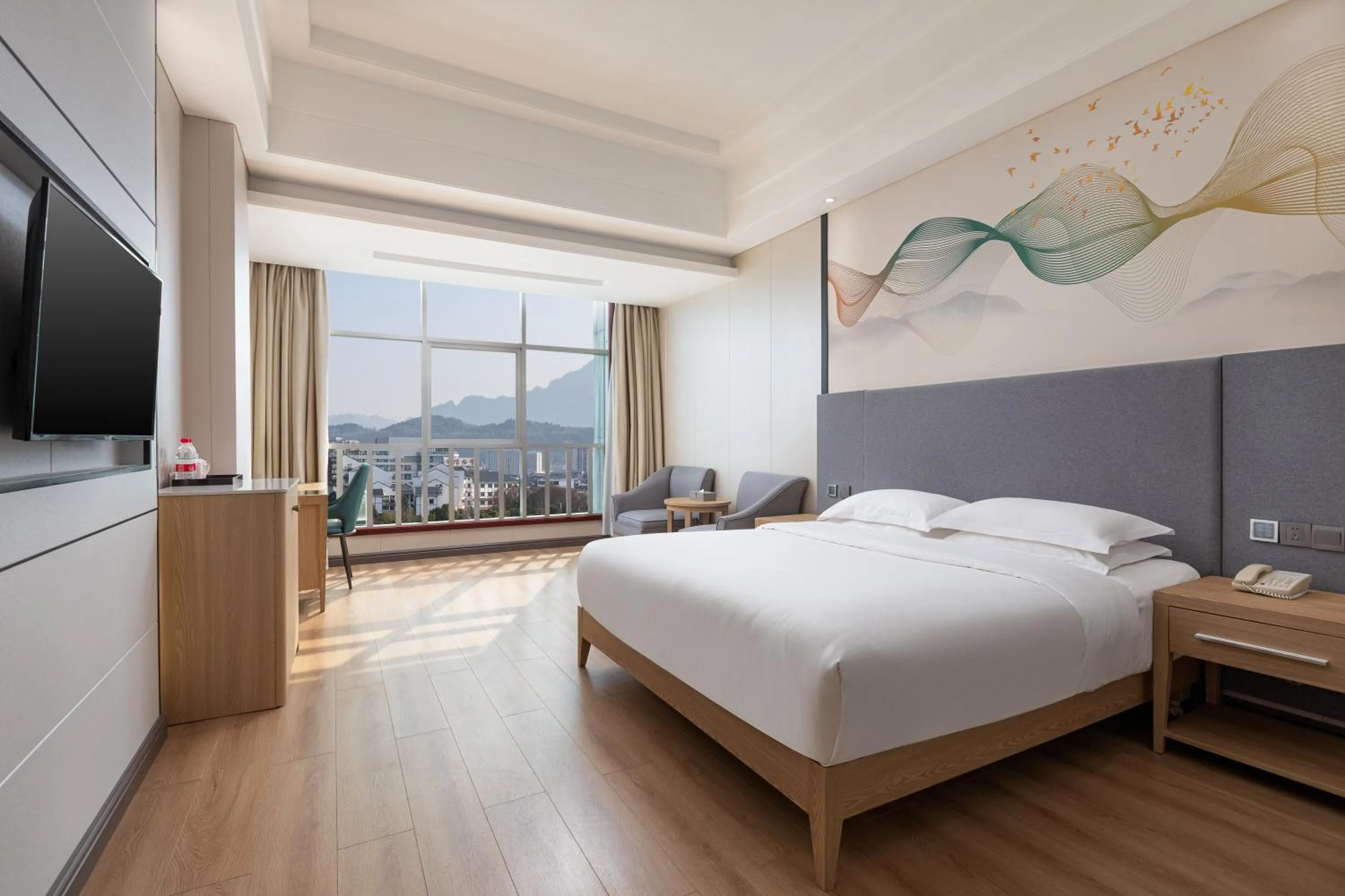 Bed in Ramada by Wyndham Zhangjiajie Tianmen Mountain