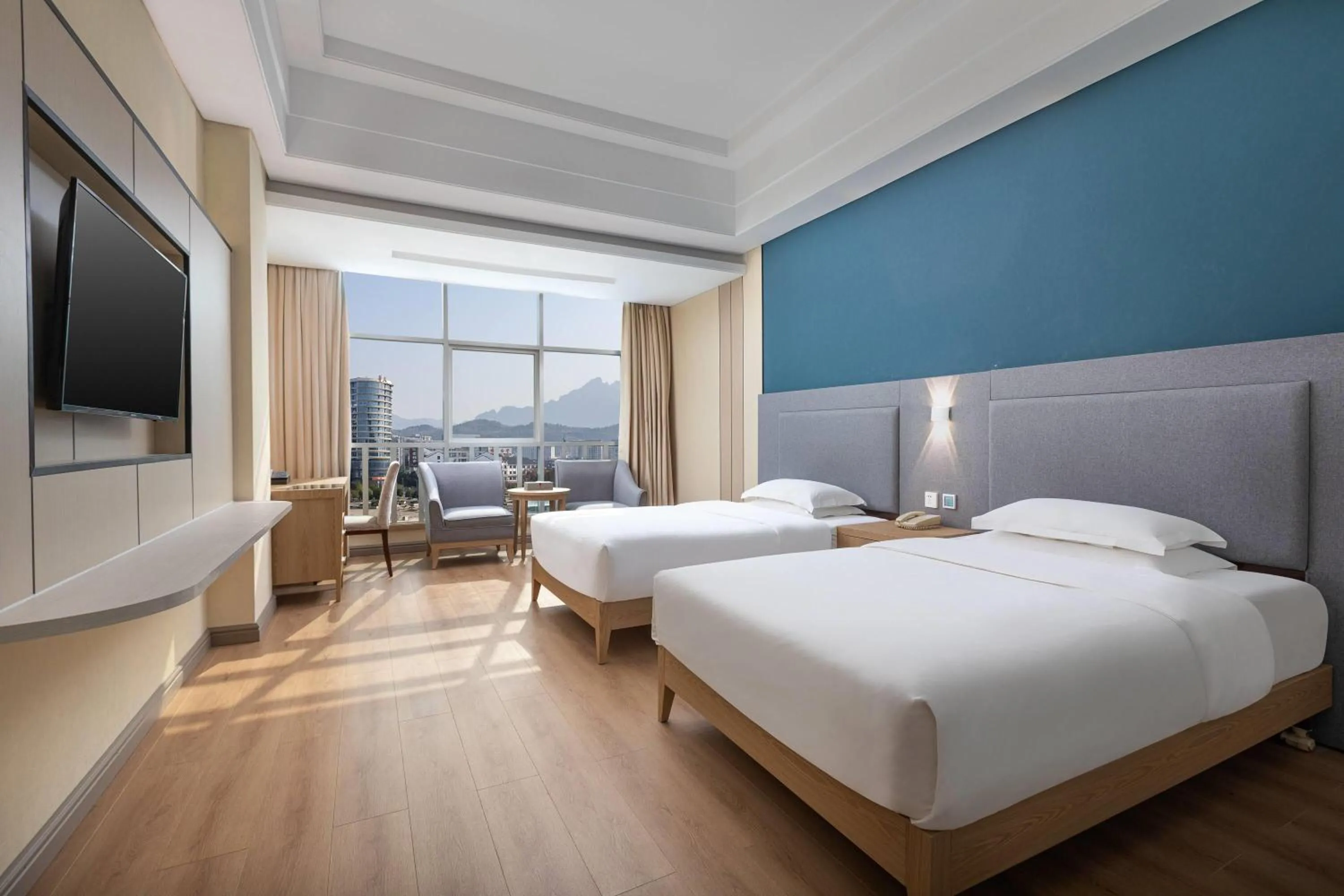Photo of the whole room, Bed in Ramada by Wyndham Zhangjiajie Tianmen Mountain