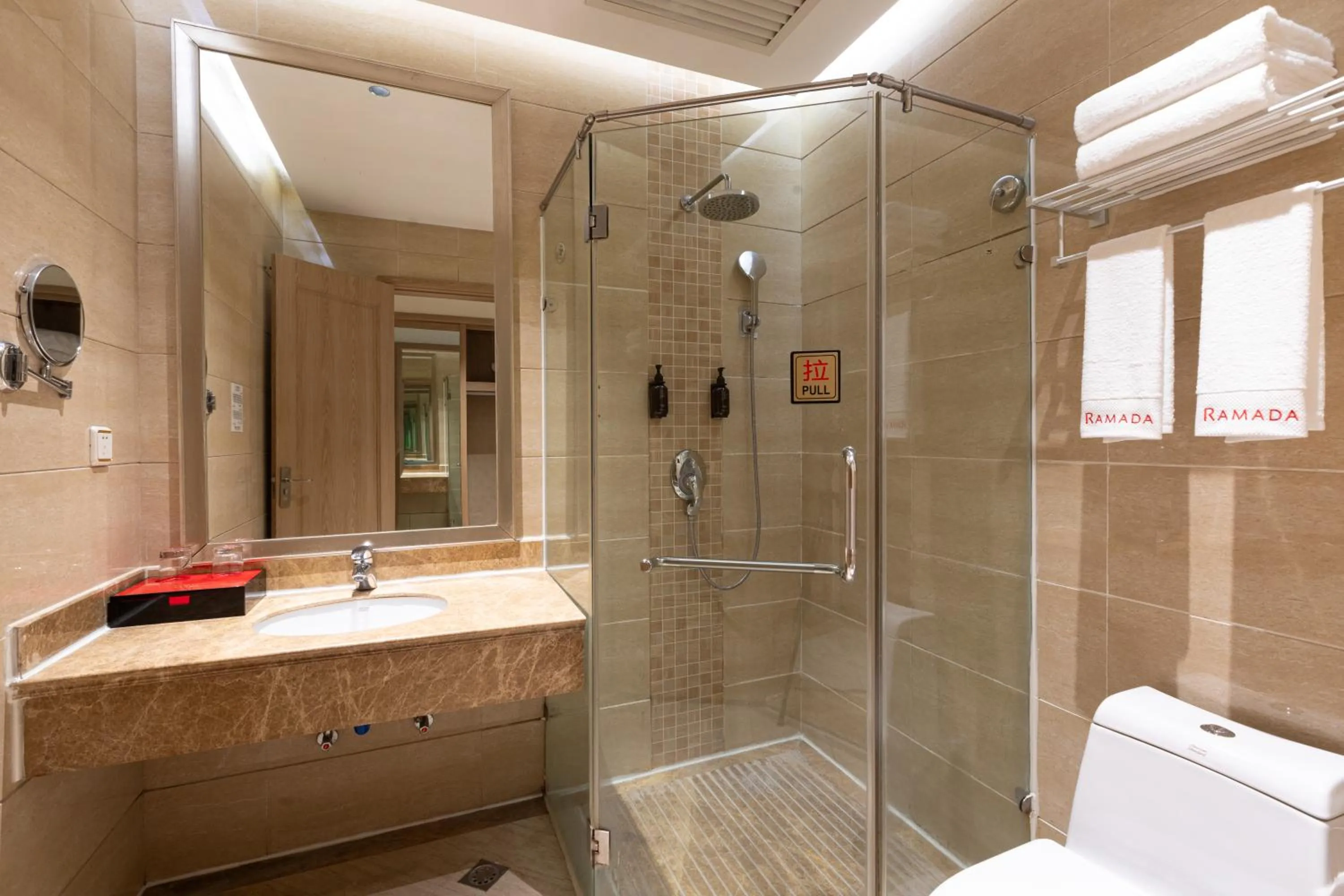 Bathroom in Ramada by Wyndham Zhangjiajie Tianmen Mountain