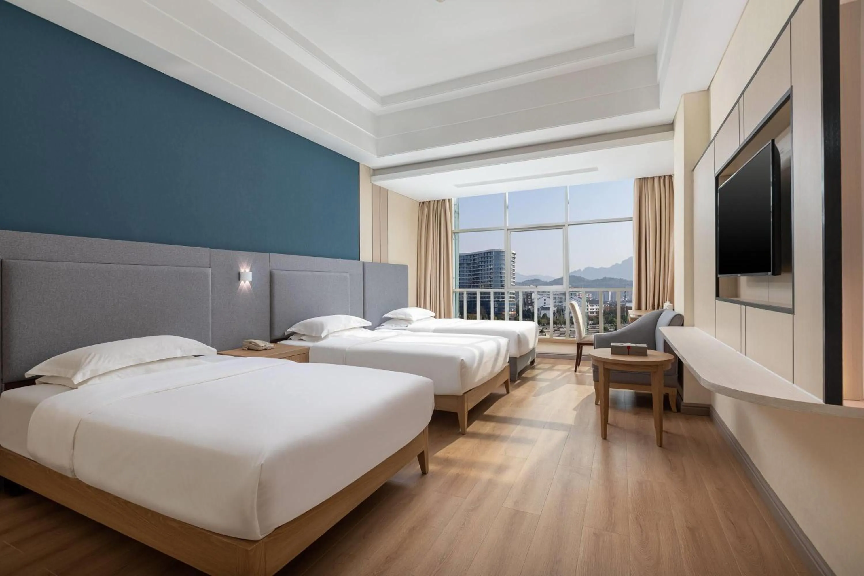 Photo of the whole room, Bed in Ramada by Wyndham Zhangjiajie Tianmen Mountain