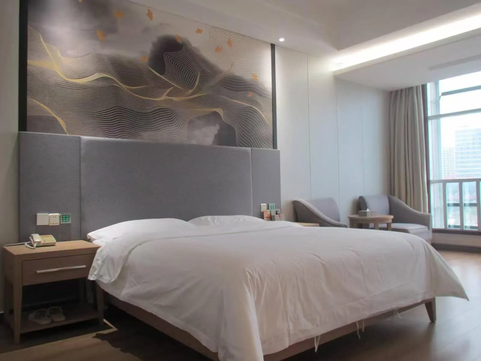 Photo of the whole room, Bed in Ramada by Wyndham Zhangjiajie Tianmen Mountain